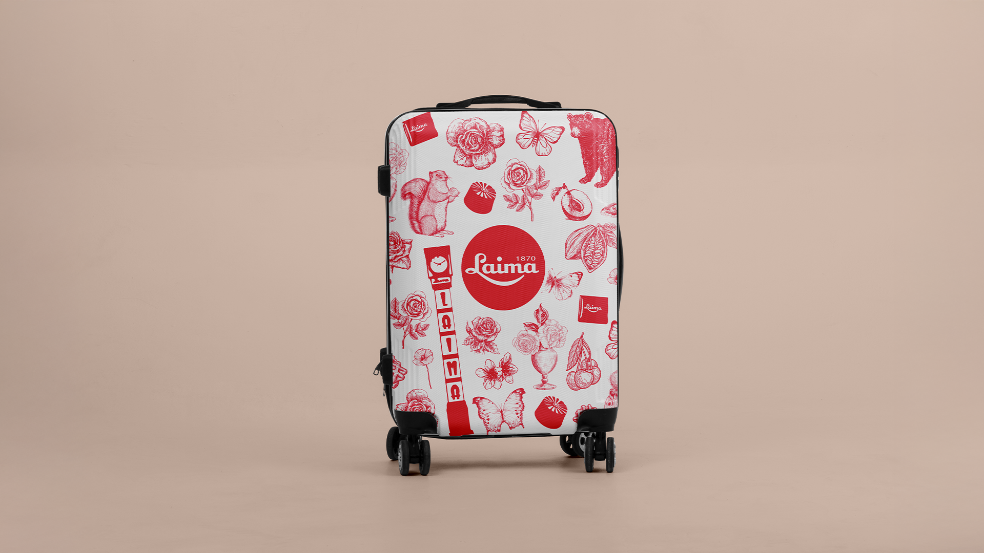 A wheeled suitcase with a white background covered in red illustrations of flowers, animals, butterflies, and the Laima logo.