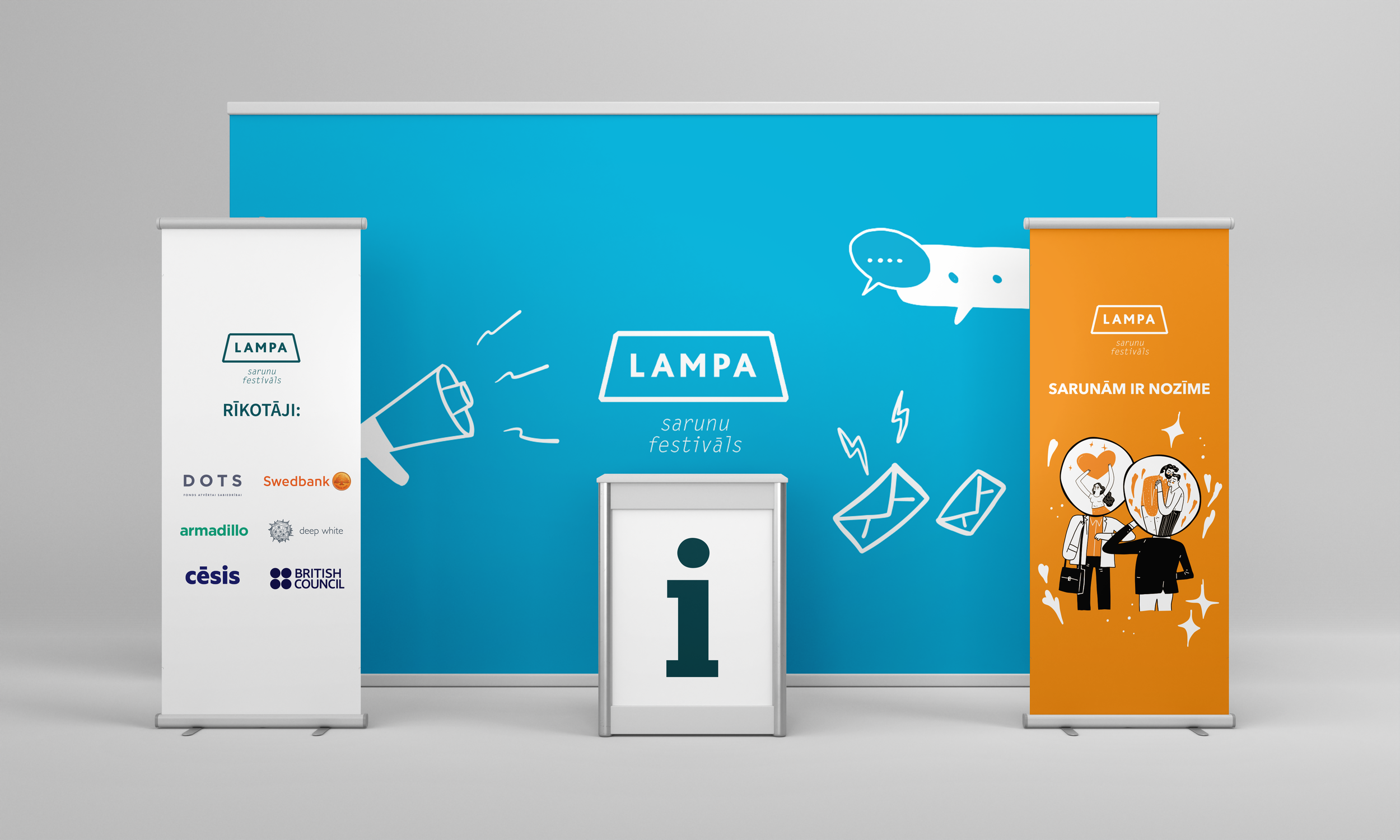 Event display with banners, one blue and two with sponsor logos, promoting LAMPA festival, featuring illustrations of a megaphone and speech bubbles, with the central info stand.
