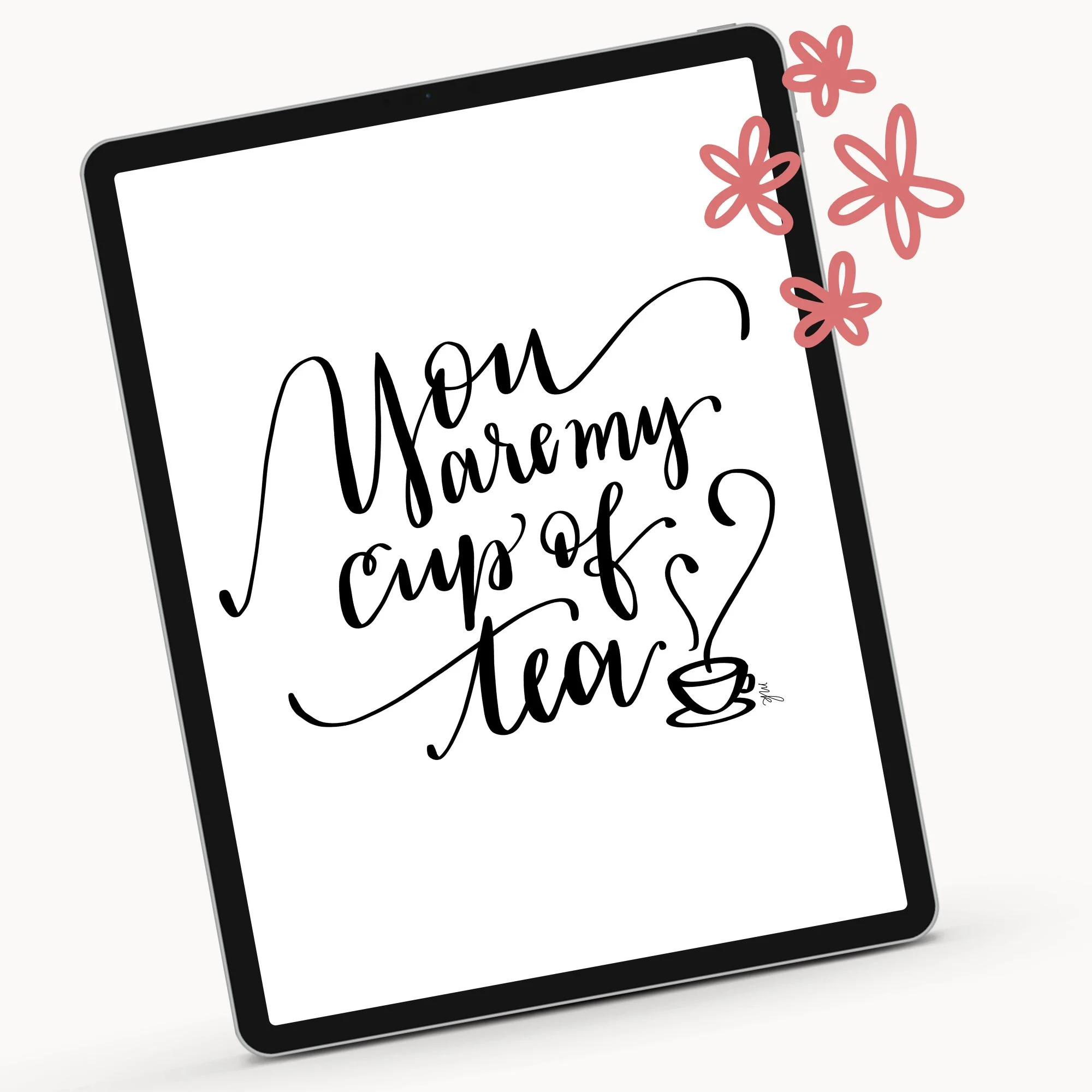Tablet screen displaying a message with hand-lettered text that says "You are my cup of tea"