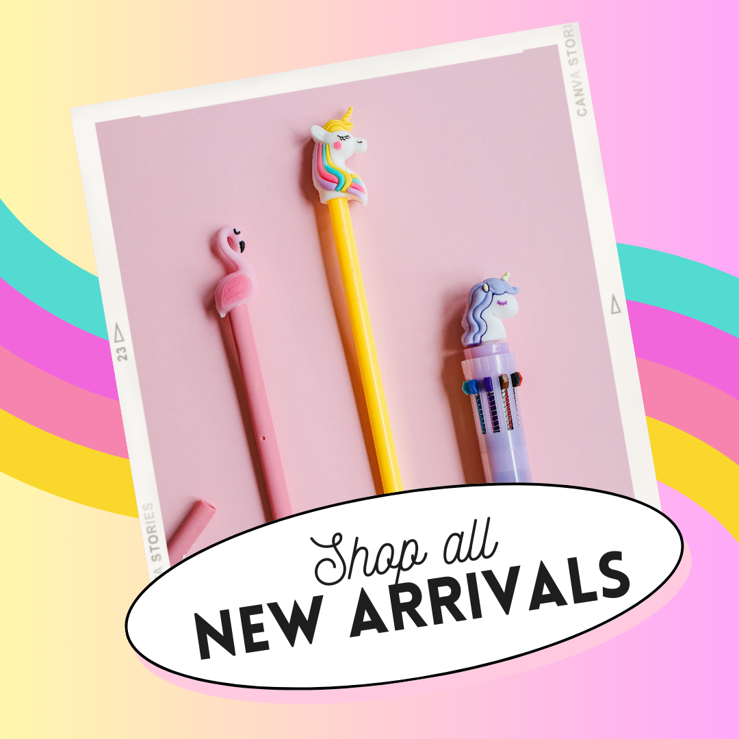 Colorful unicorn-themed pens and gel pens on pink background with a multicolored rainbow overlay and a white oval badge with black text reading "Shop all new arrivals."