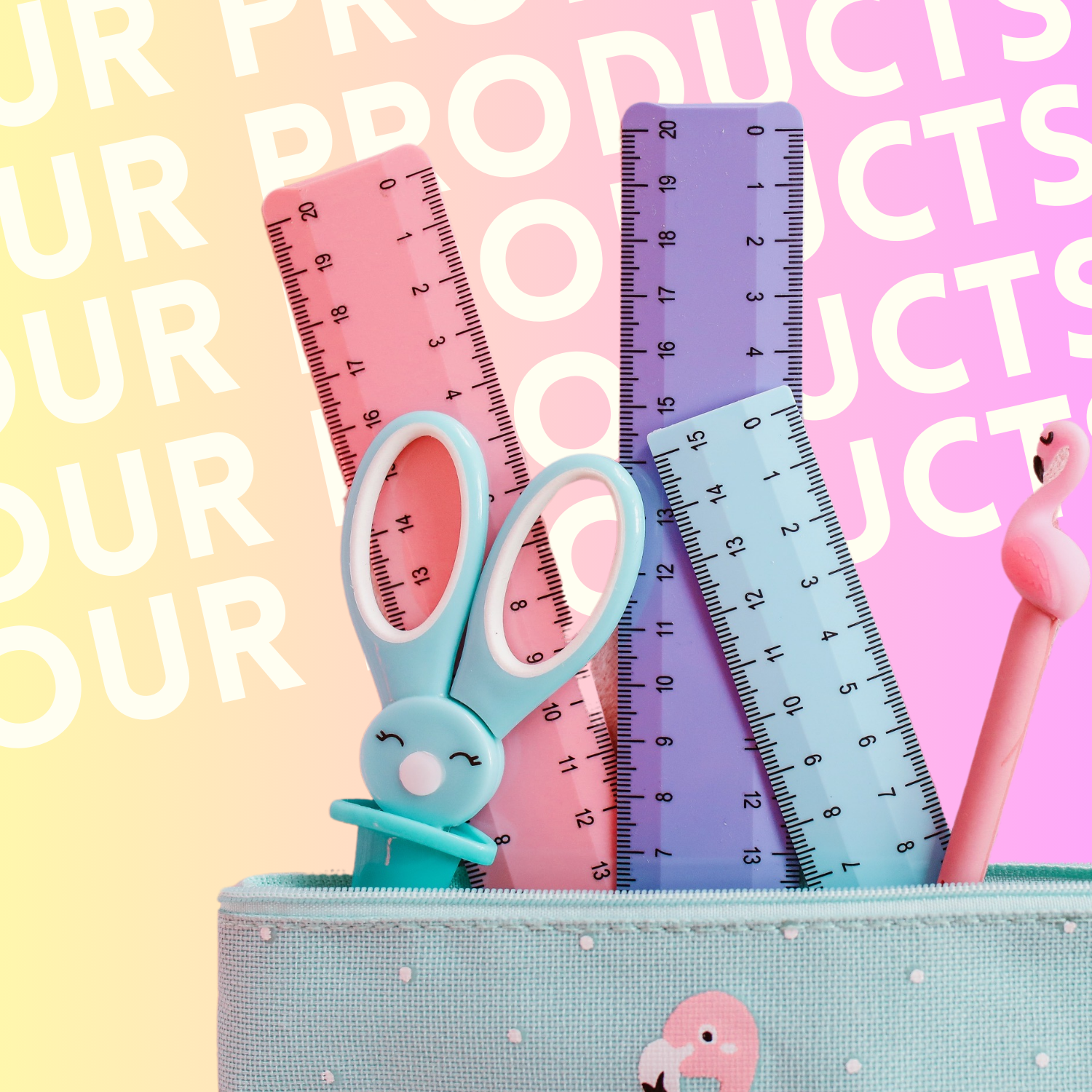 Colorful craft supplies including pink, purple, and blue measuring rulers, a pair of blue scissors, and a pink flamingo-shaped stick inside a light blue container with a flamingo illustration on it. Background features repeating text saying 'OUR PRODUCTS' in white on pastel pink and yellow.