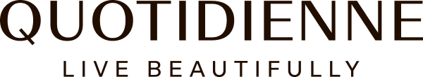 Text reading 'QUOTIDIENNE LIVE BEAUTIFULLY' on a dark background.