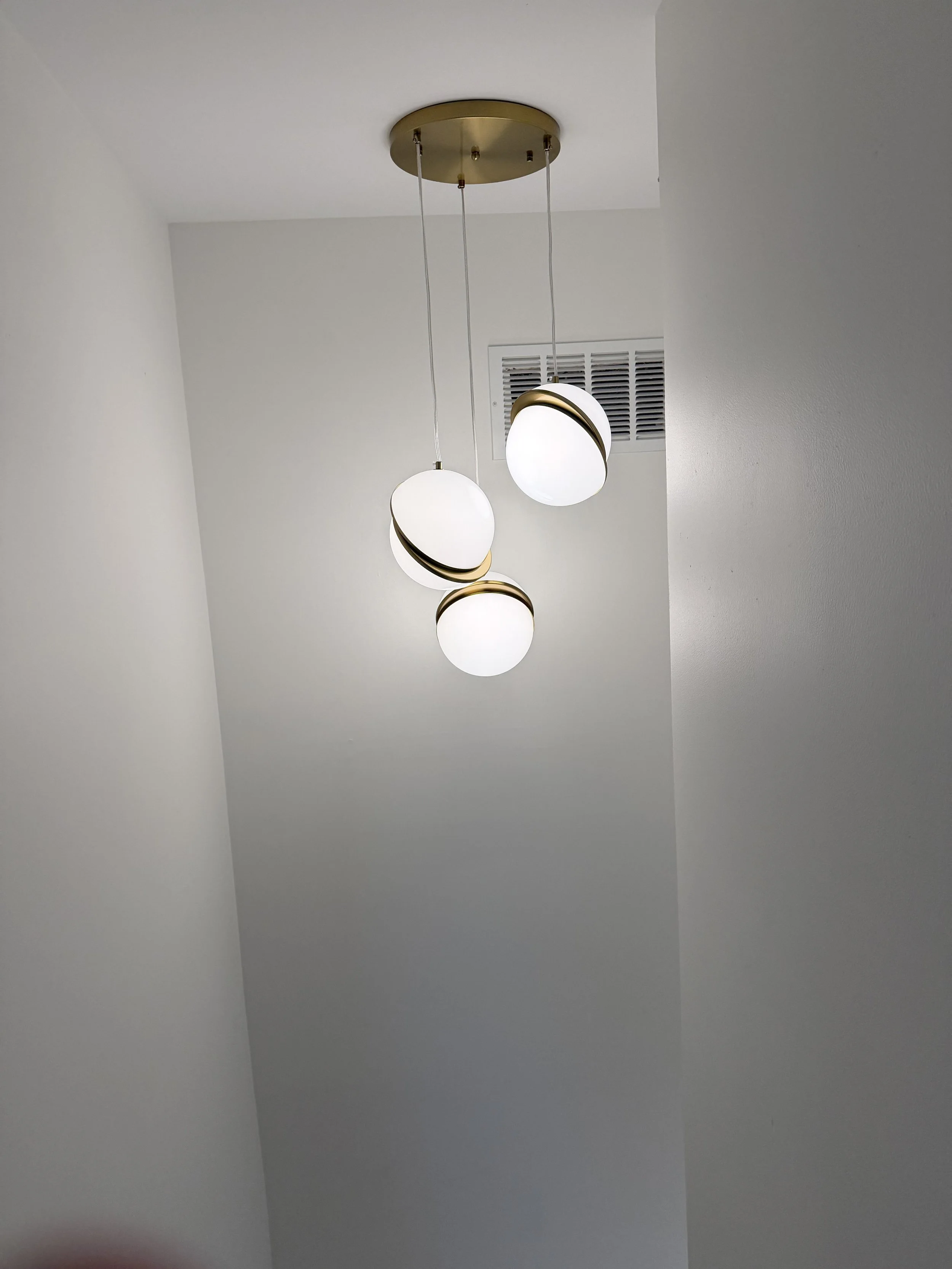 MCM chandelier in stairwell