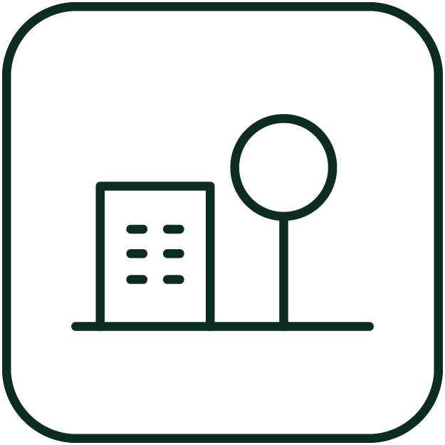 Line drawing of a building with windows, a tree, and a horizontal line representing ground