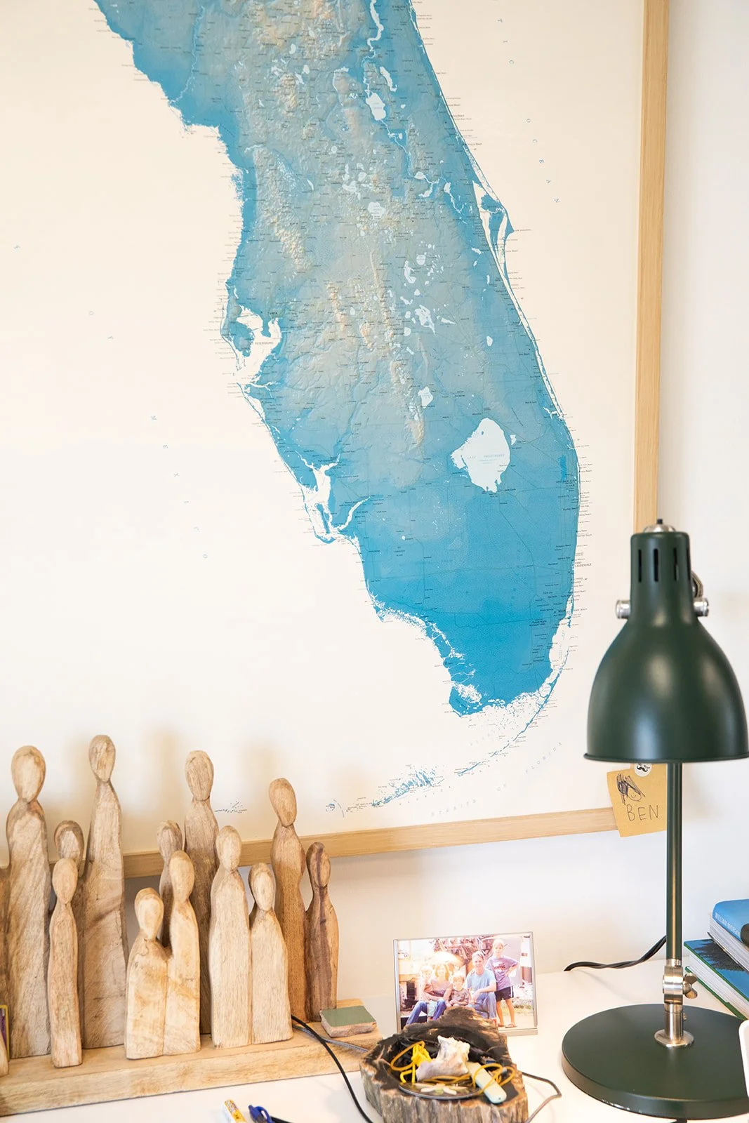 Map of Florida above a desk in the Ben Dinkins Landscape Design studio