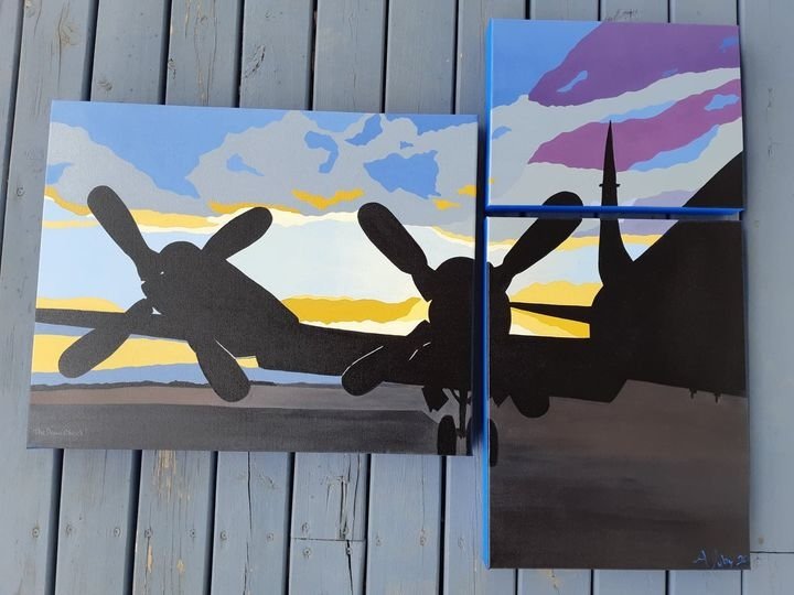 photo of three paintings that make up a plane with sunset background