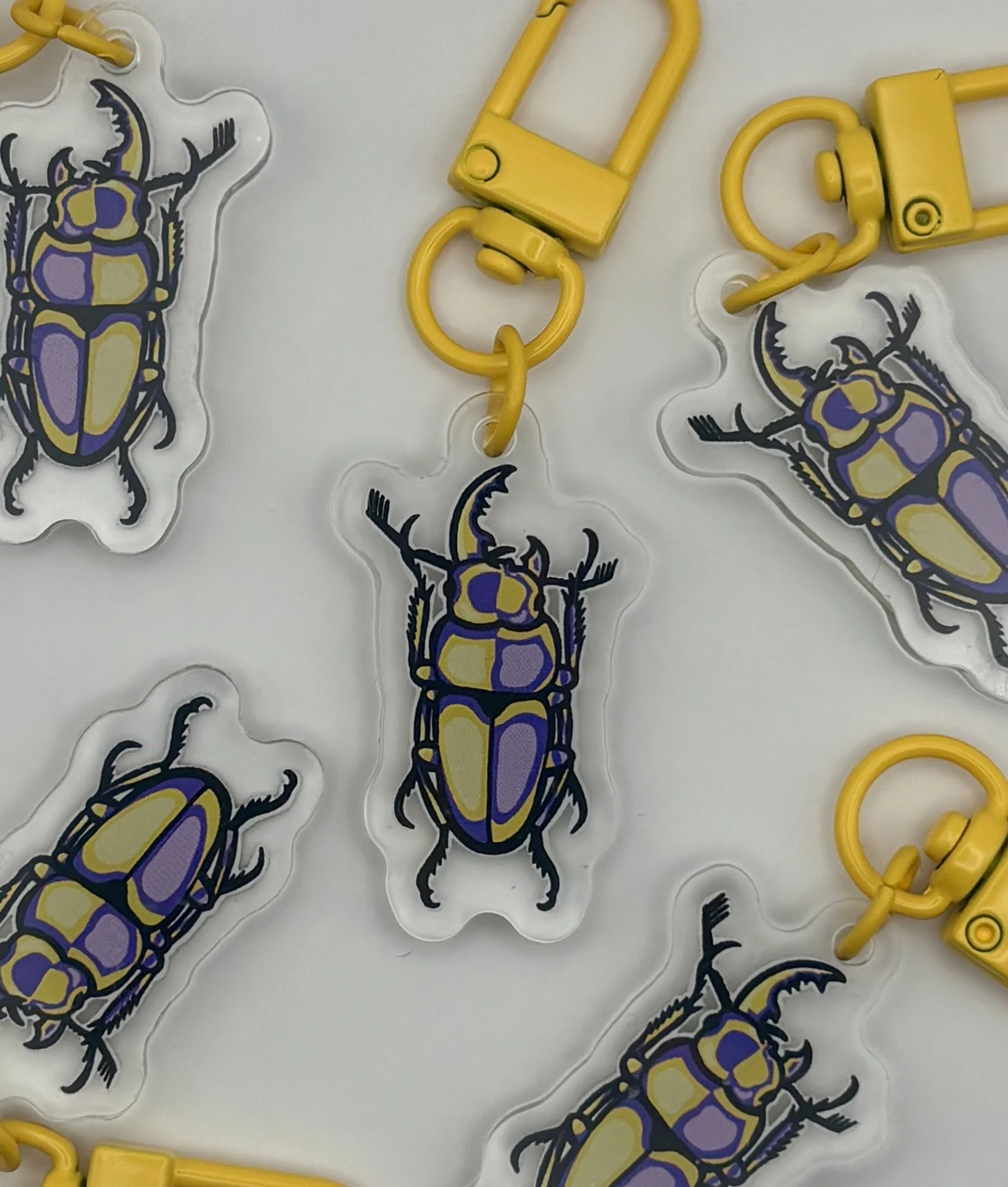 Nonbinary Beetle Pride Keychain