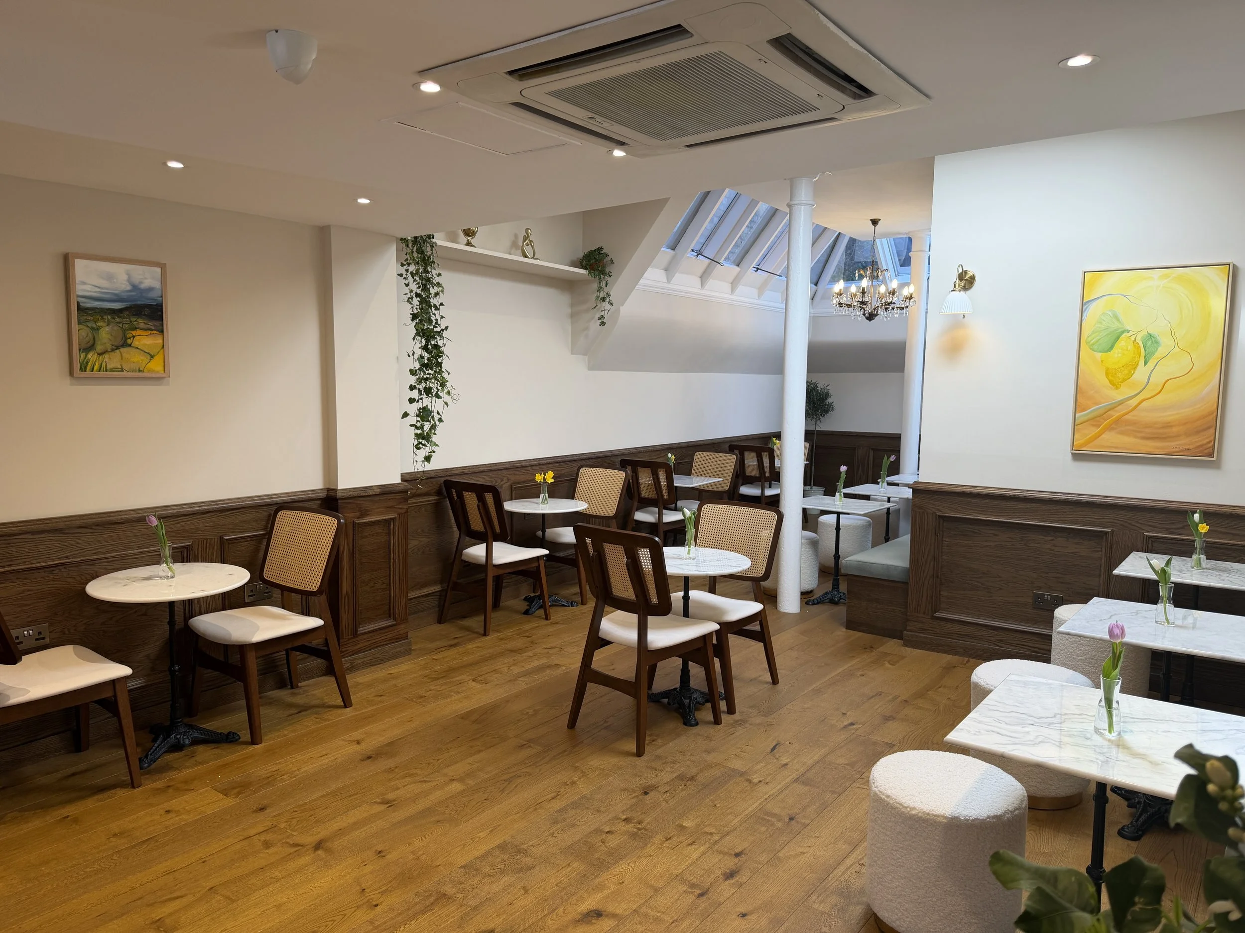 Stillroom Chelsea cafe interior on Old Church Street, London.