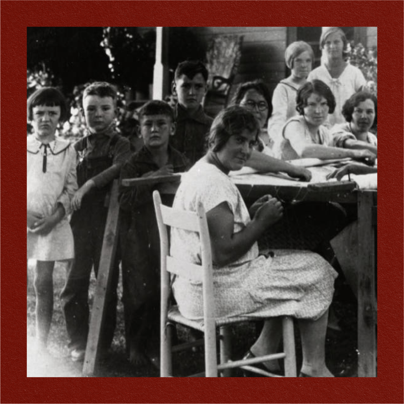 QUILTING PARTY (1932) -
A quilting party in front of Shell house, Cherokee Community.