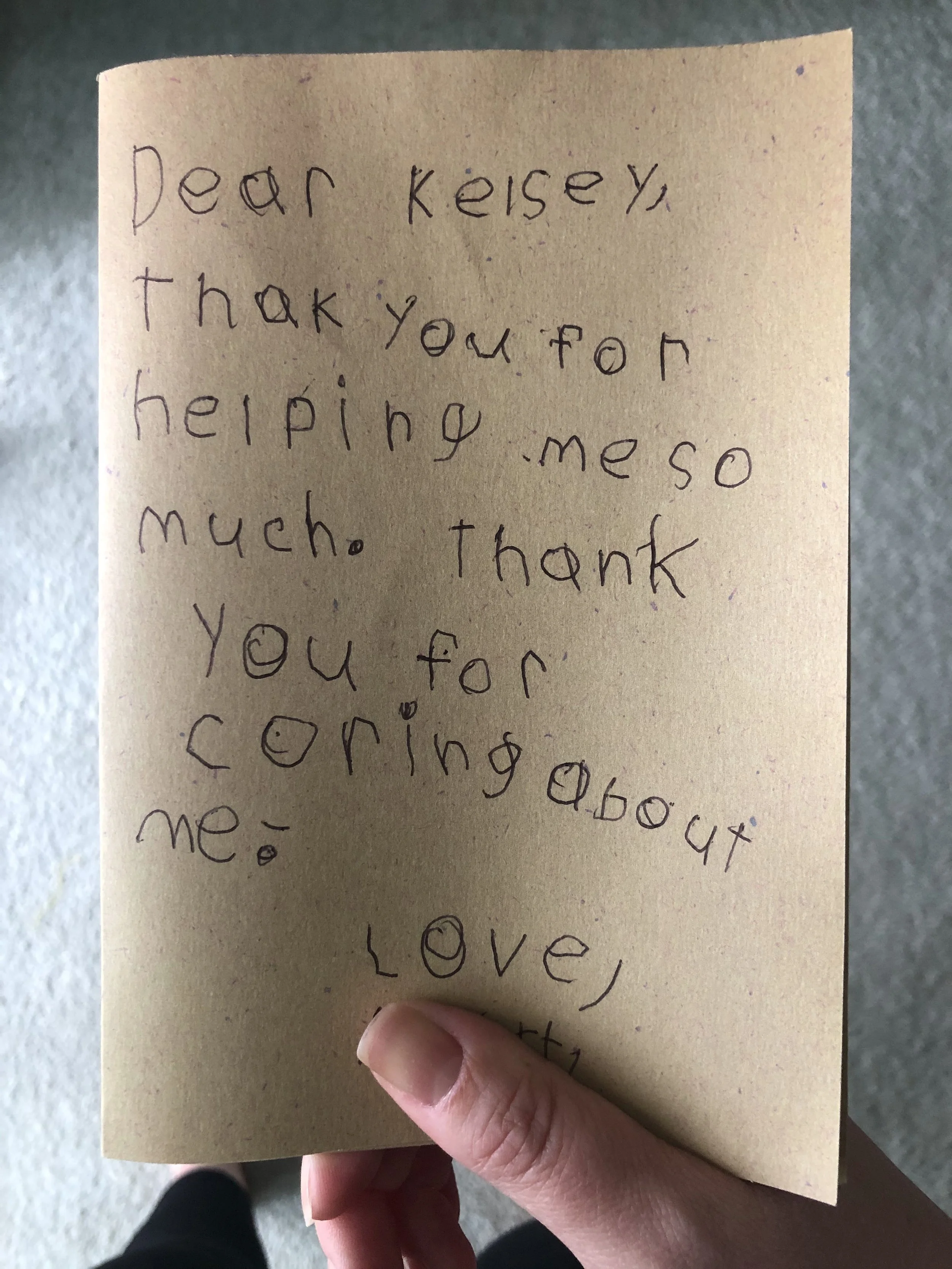 A handwritten note on a yellow piece of paper that says, 'Dear Keisey, Thank you for helping me so much. Thank you, love;'