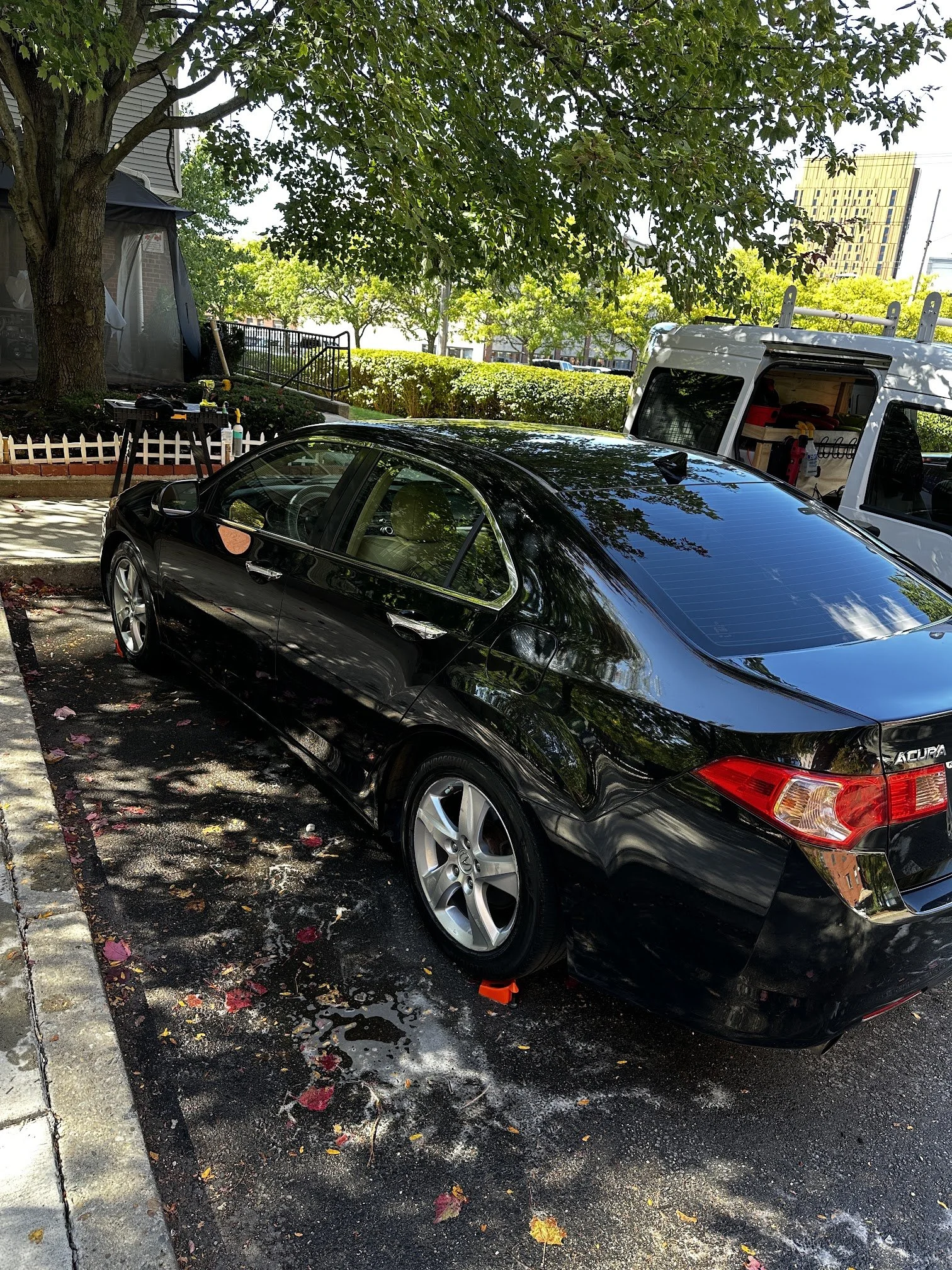 Black Acura sedan after a Deep Shine Deluxe exterior detail