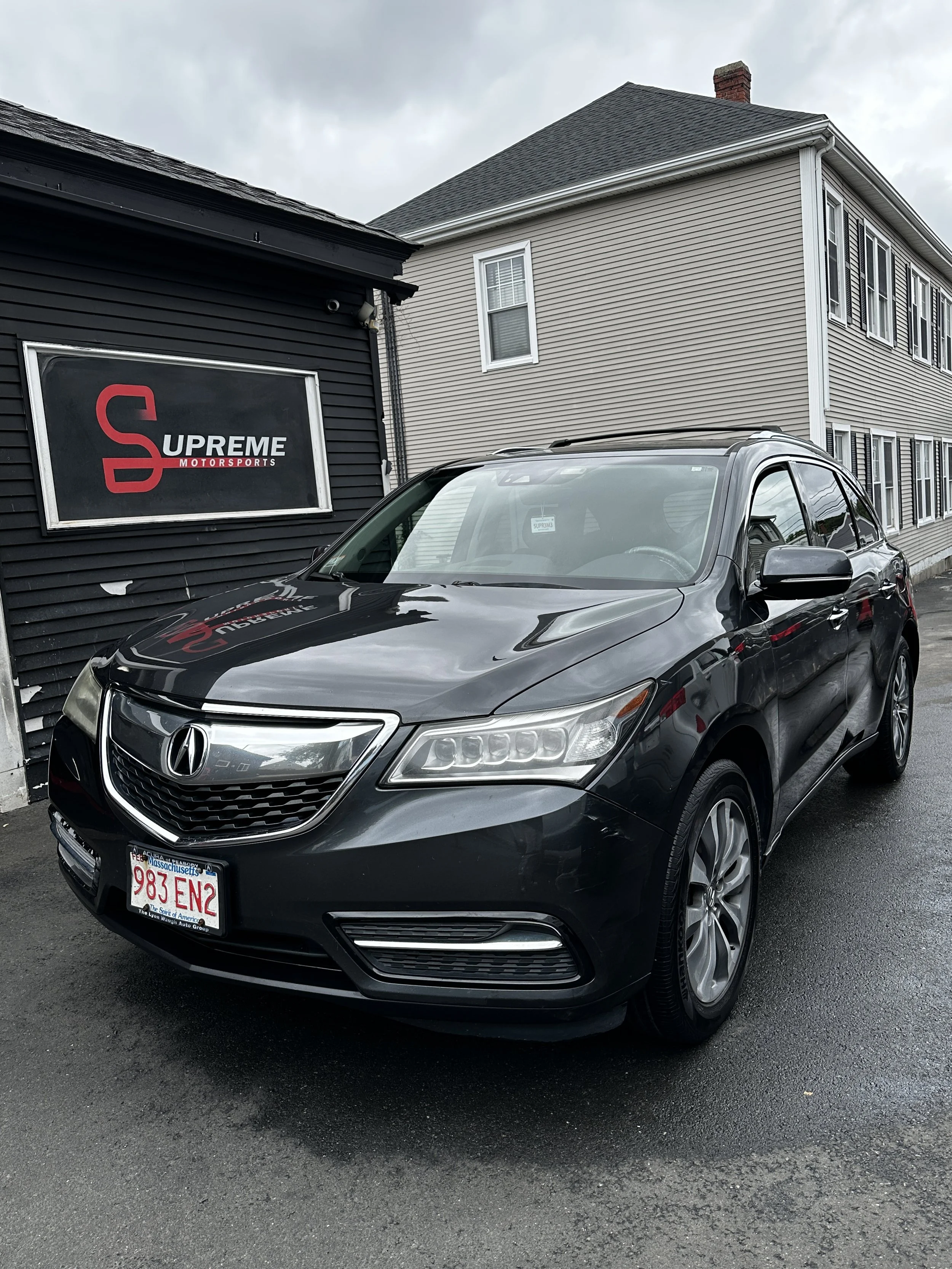 Black Acura SUV outside Show Form Studio at 10 Aborn St, Salem, MA