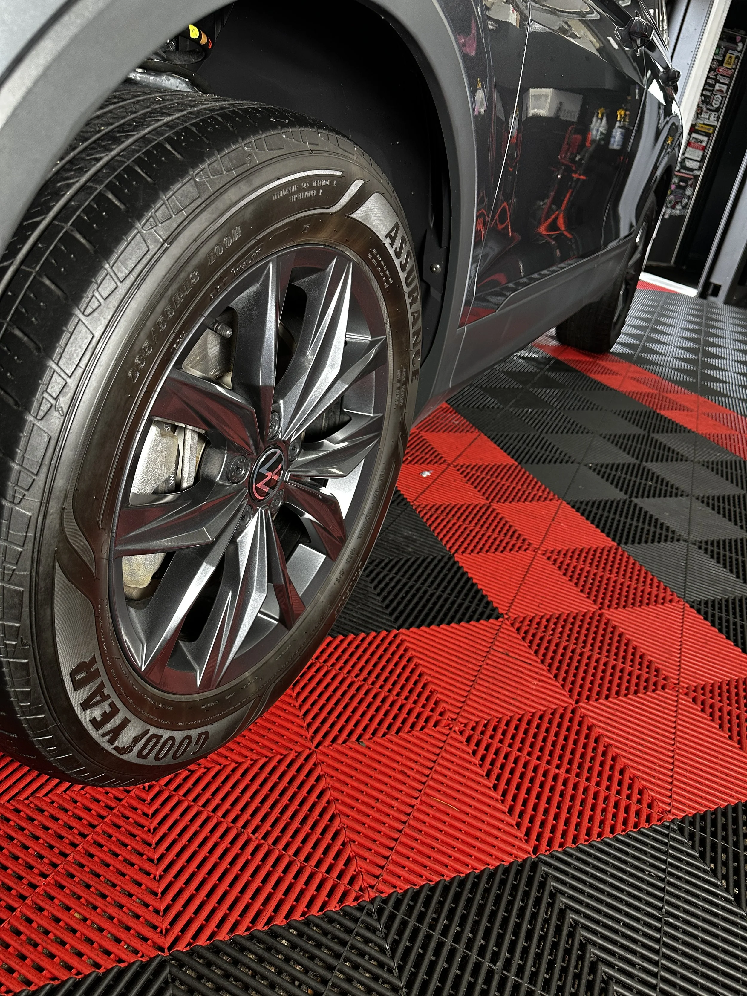 Cleaned and dressed wheel and tire after a Show Form Studio detail