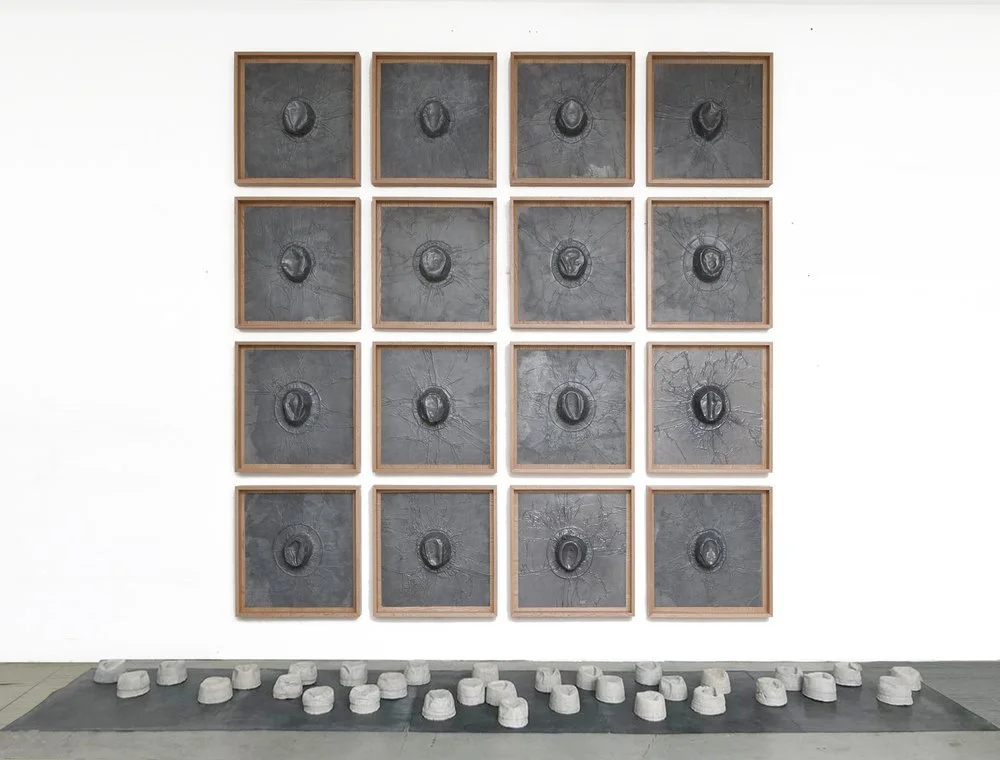 Gray Matter, 2019
16 Hats Belonging to My Father (1905-1978) Embossed in Lead, and 32 Concrete Casts of the Inside of the Hats
 197” x 157” x 48”

Materia Gris, 2019 
16 Sombreros de Mi Padre (1905 – 1978) Repujados en Plomo y 32 Moldes de Concreto d