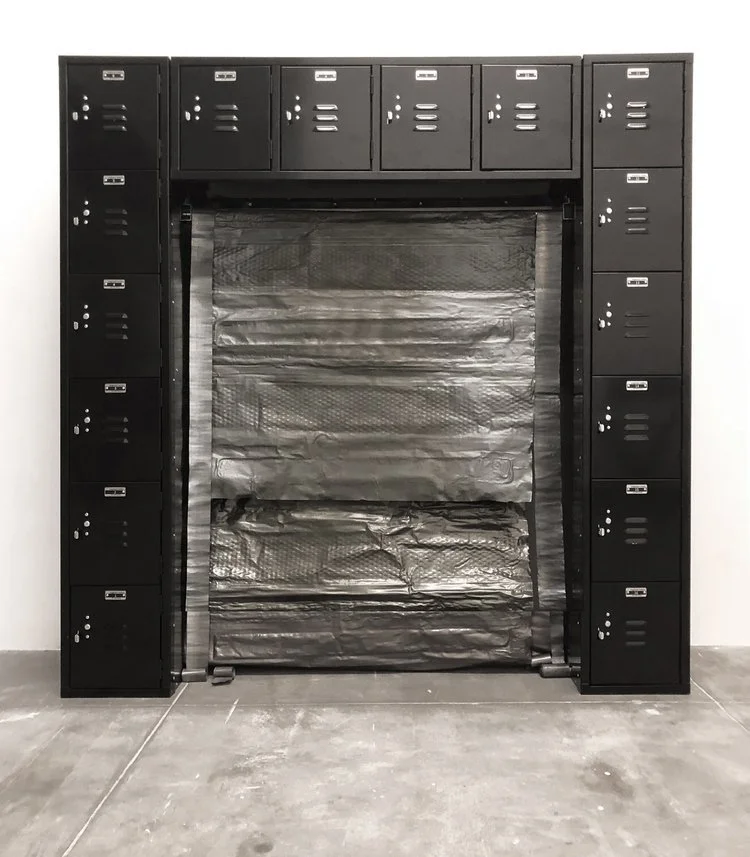 “16 Rocks for 16 Reliquaries” [Batman Rocks], 2018
Repurposed Lockers, Rocks and Lead
72” x 72” x Variable

"16 Rocas por 16 Relicarios" (Batman Rocks), 2018 
Lockers, Rocas y Plomo Reutilizado
183 cm x 183 cm x Variable