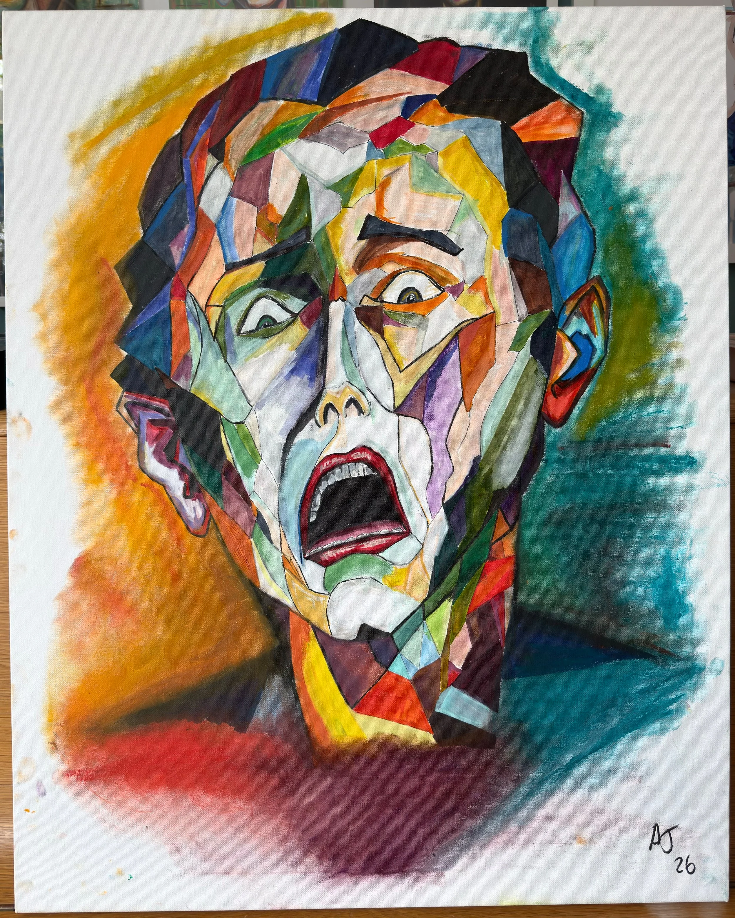 A colorful abstract portrait of a person with a shocked or scared expression, painted with geometric shapes and bright colors.