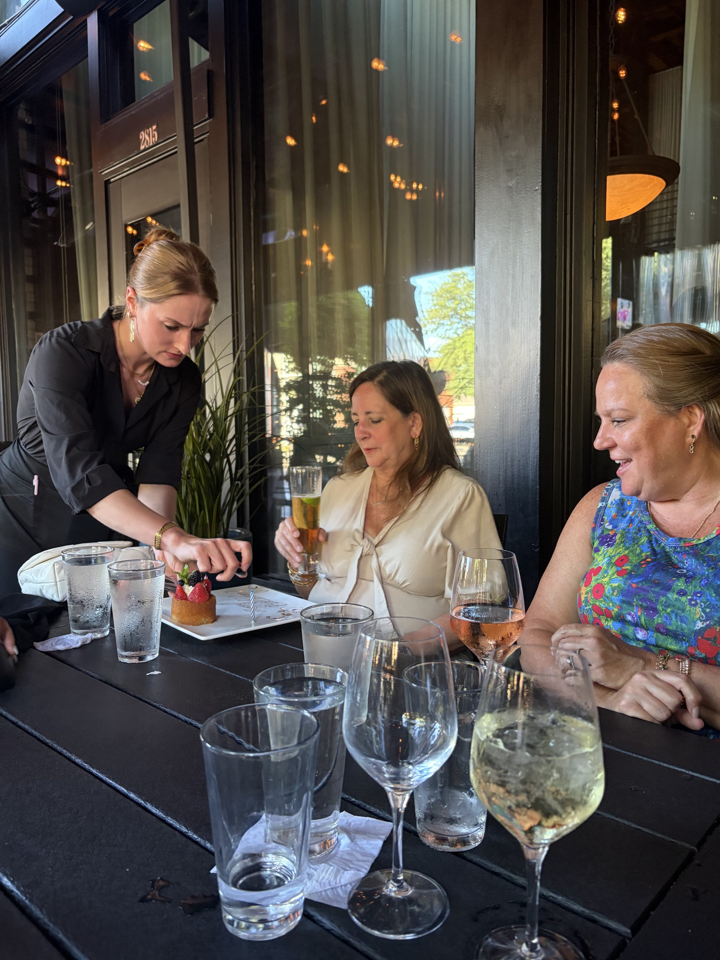 Adults 50+ dining together at a restaurant.