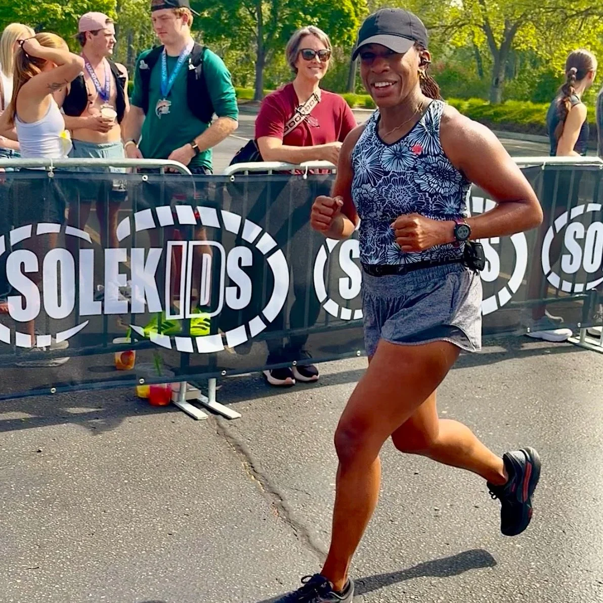 Adult 50+ running in a road race.