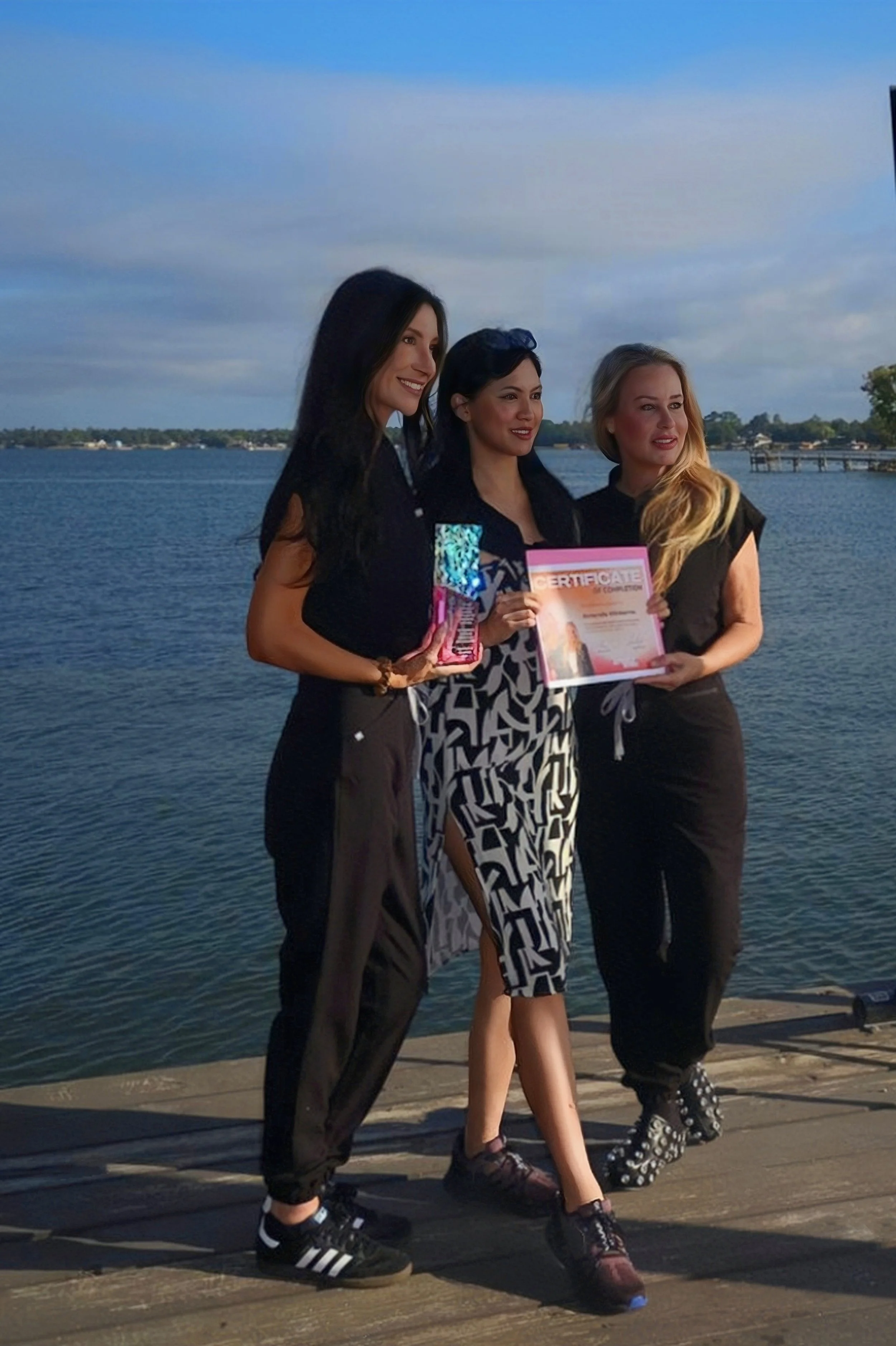 Standing next to Shay Danielle and Sherah Juarez for recognizing and certifying from paramedical artist academy