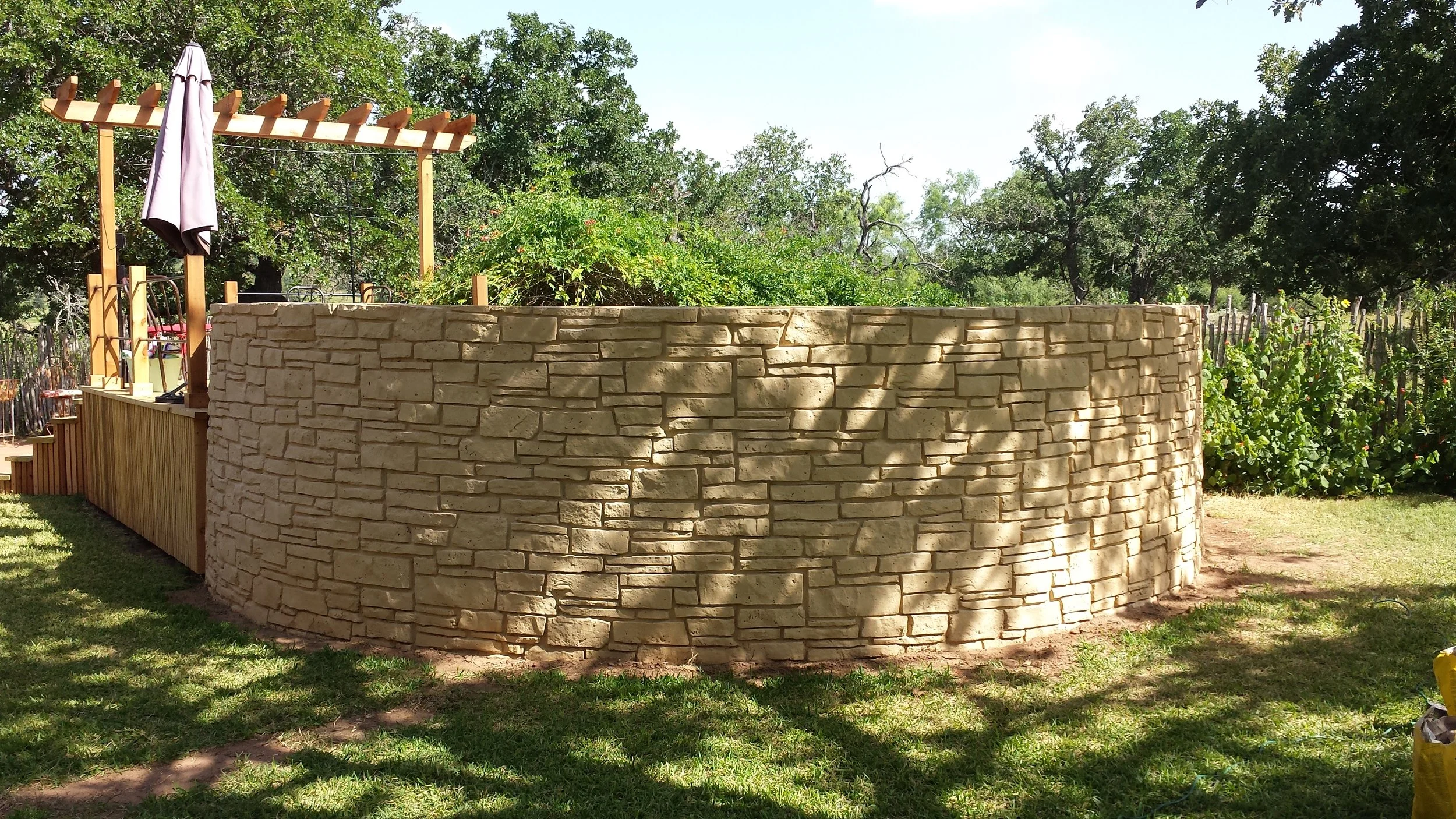 ABOVE GROUND 20 FT. FULLY STAMPED CONCRETE