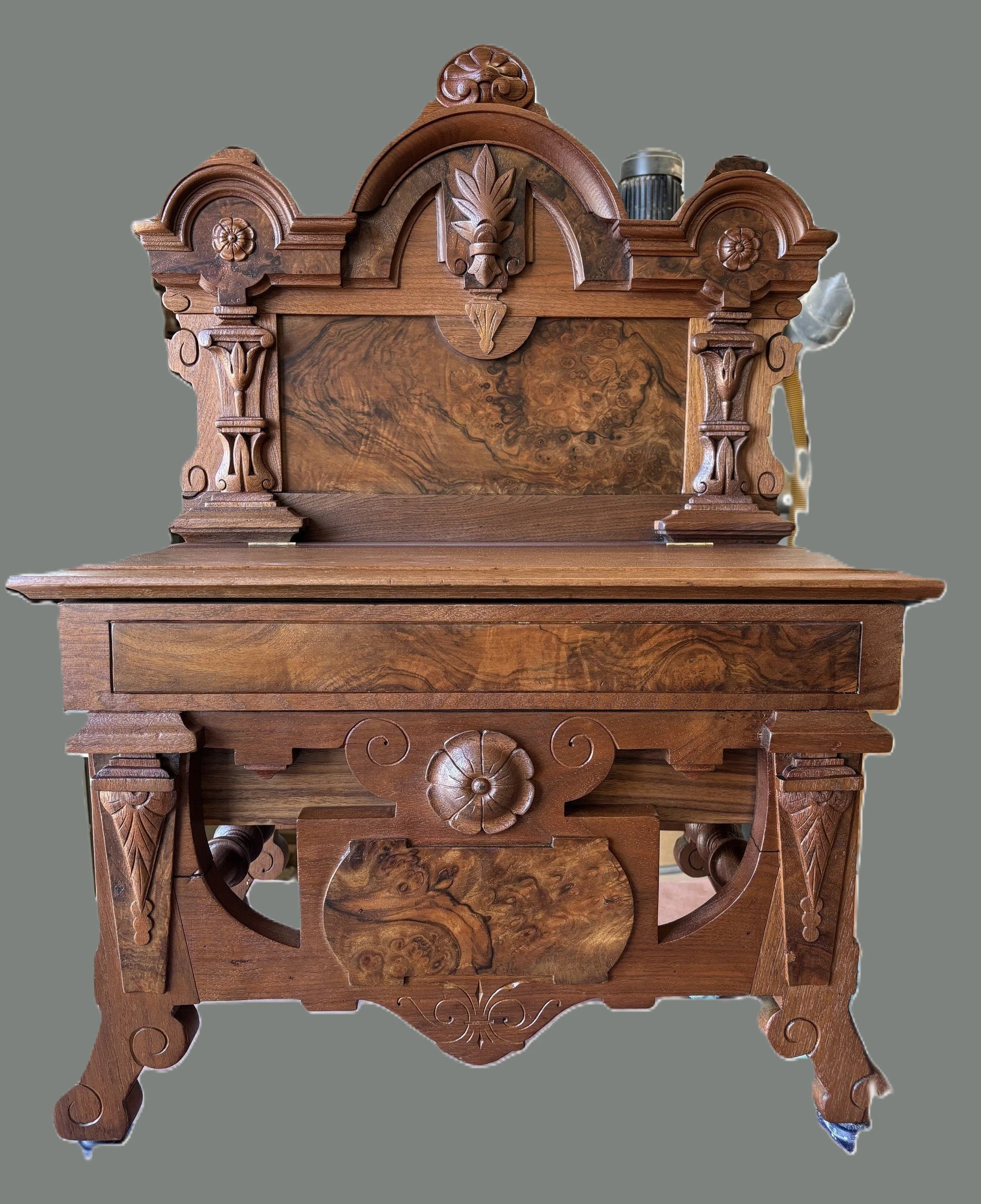 Antique bench was restored to original beauty with hidden storage for civil war chess pieces. 