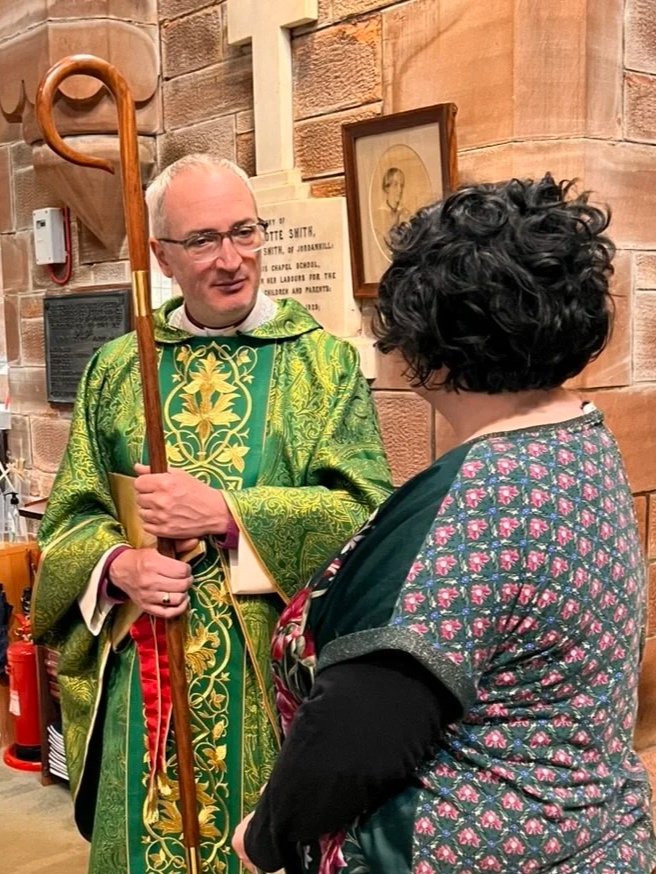 Bishop Nick with a member of our congregation.