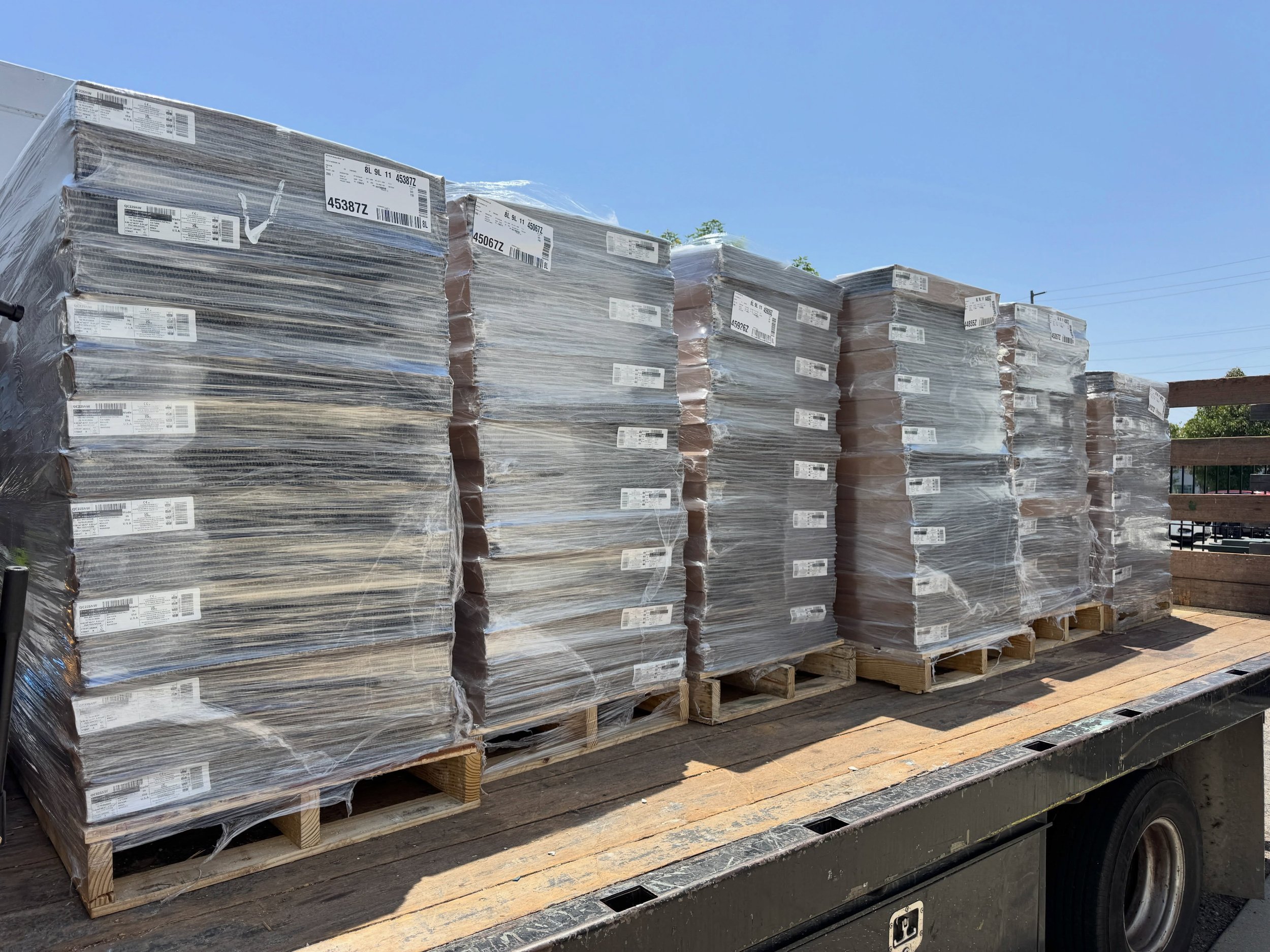 ALL ABOARD! Over 7,200+ square feet of carpet tiles being delivered this morning to the job site.