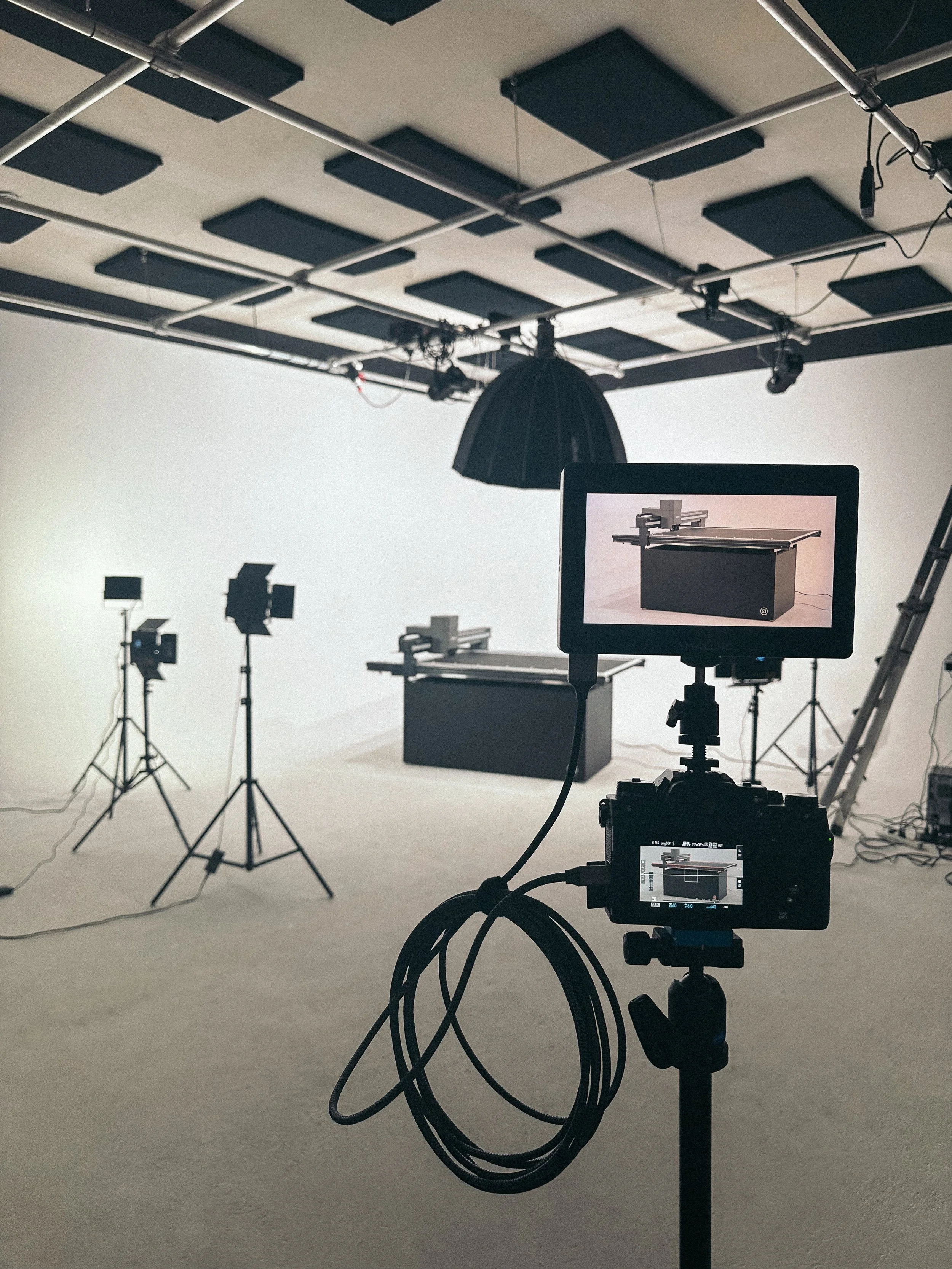Behind-the-scenes studio setup for photographing a Wizard computerized mat cutter.