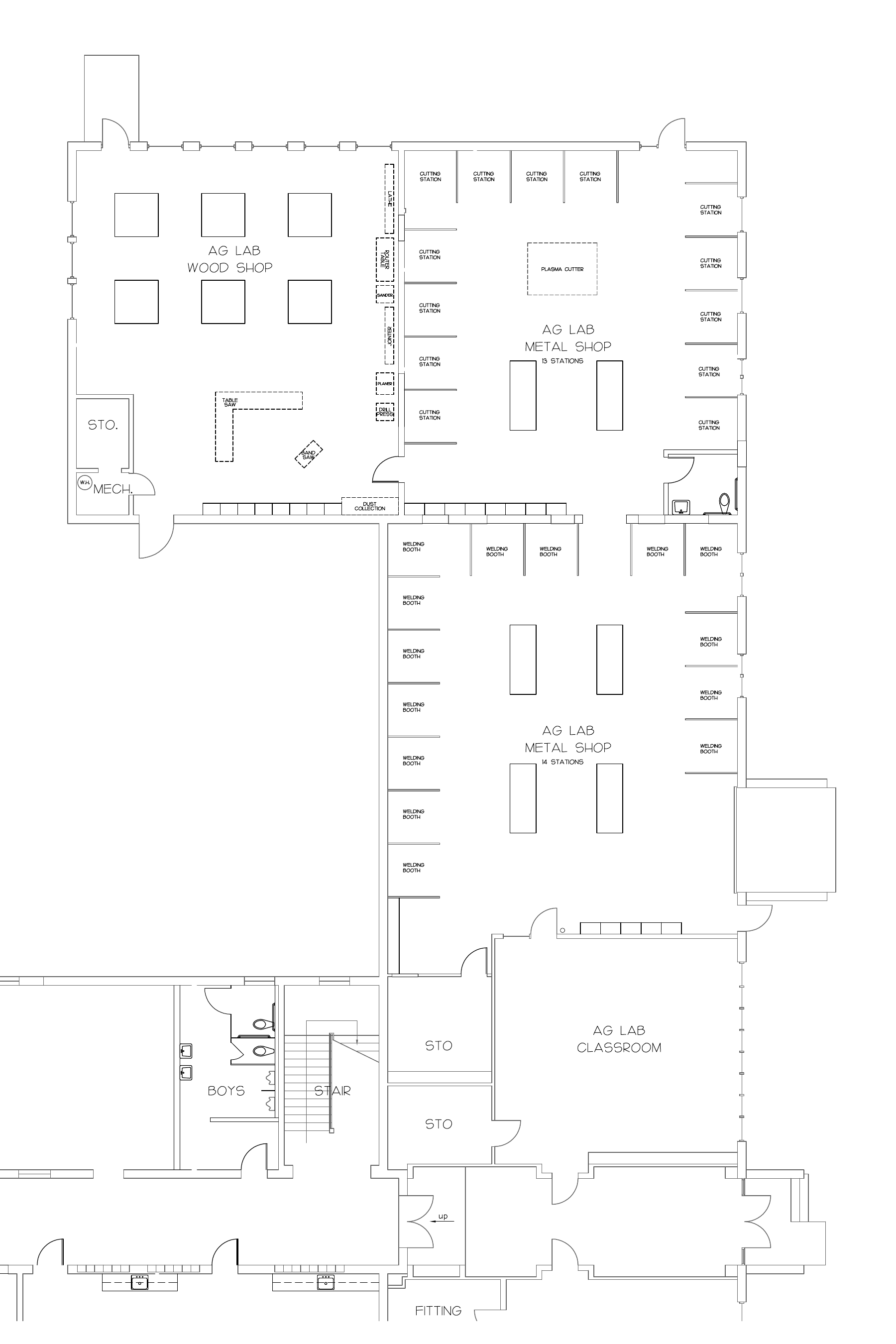 Detailed architectural floor plan of an agricultural lab with designated areas for wood and metal workshops, classrooms, storage, and utility spaces, including cutting stations, welding booths, and restrooms.