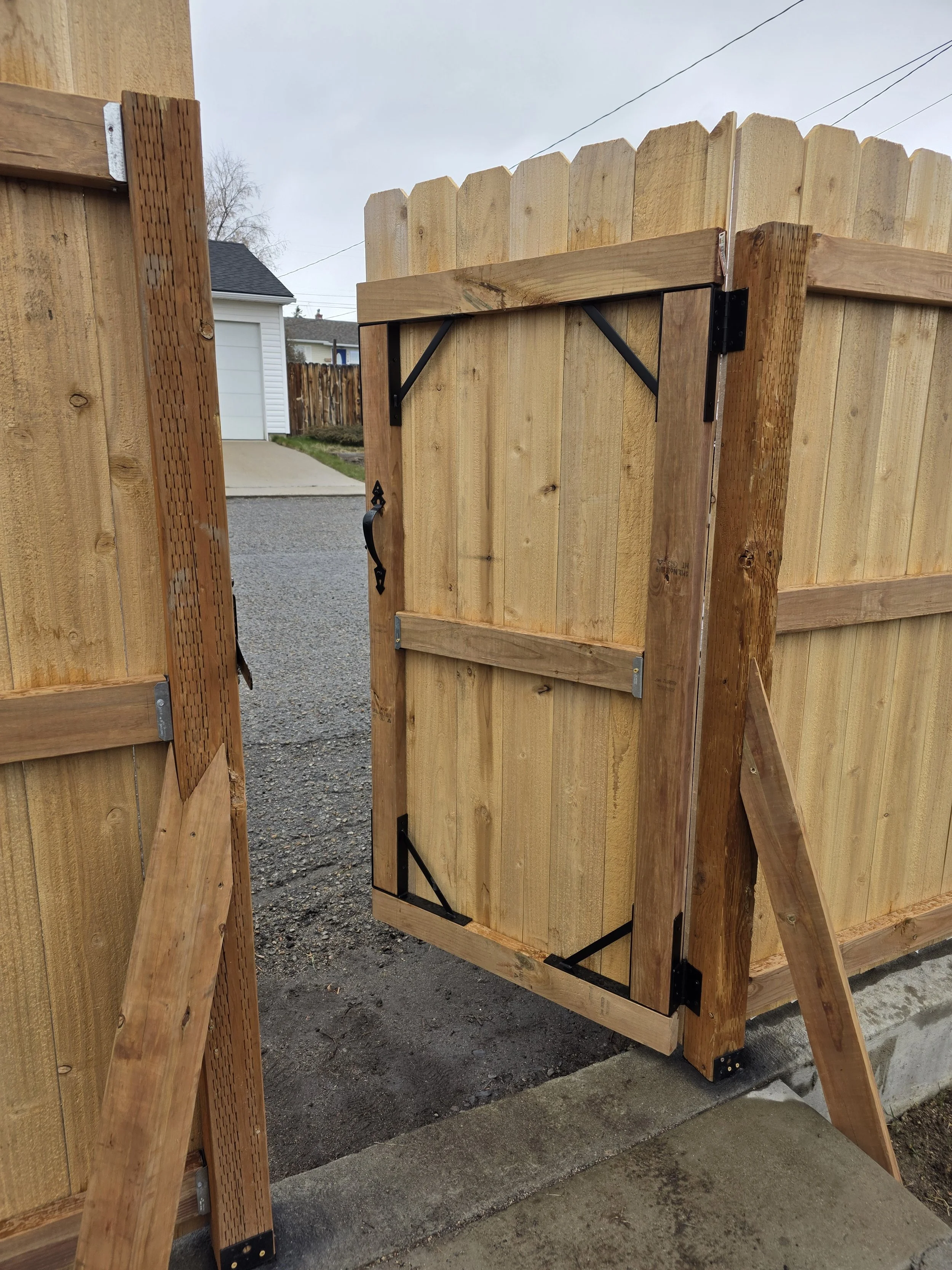 New cedar gate with frame and hinges on a Walkerville, Montana privacy fence