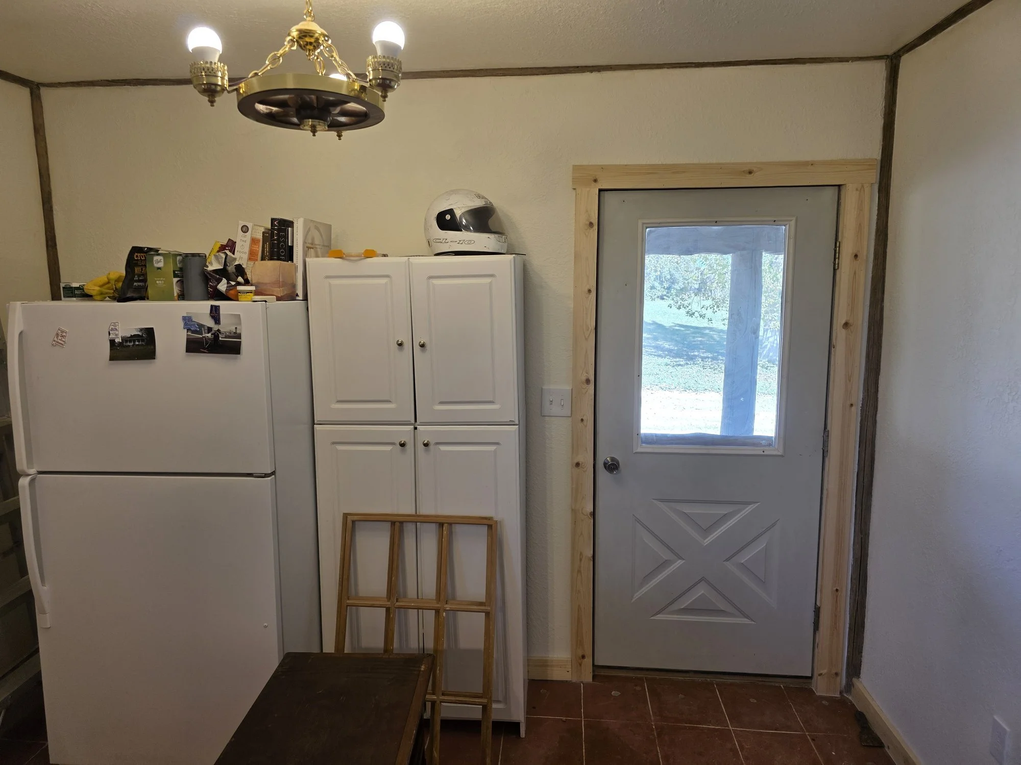New pantry door and trim in a Cardwell, Montana bunkhouse kitchen