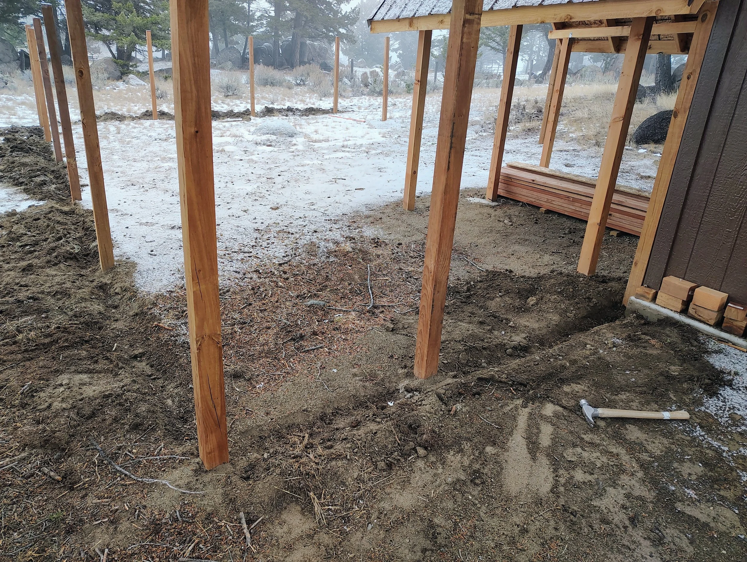 Posts set for the chicken run alongside the coop, Pipestone, Montana