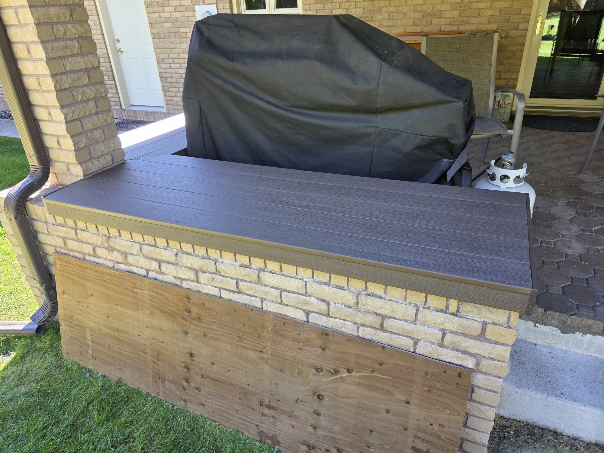 Composite bench top on the patio planter next to the grill, Butte, Montana