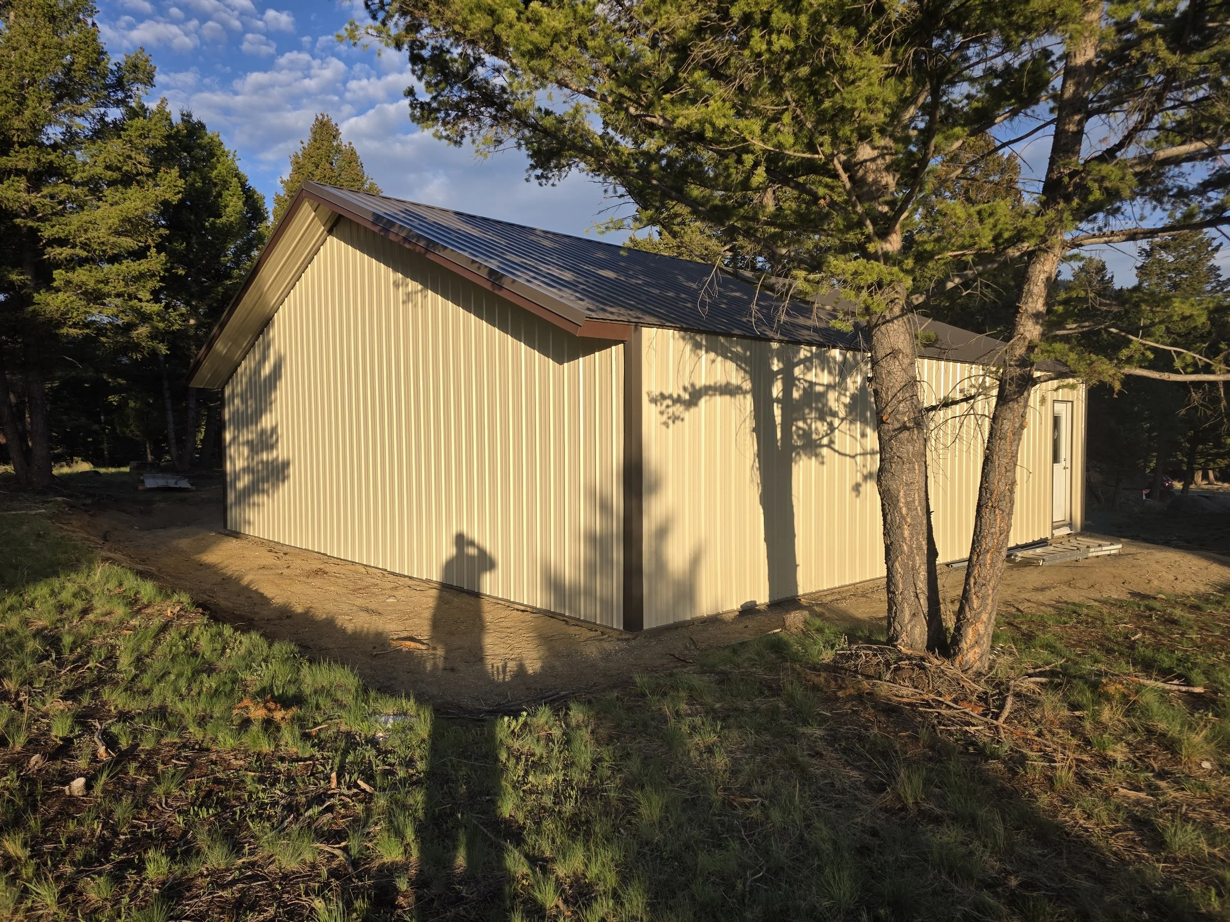 Finished pole barn woodworking shop in the trees, Whitehall, Montana