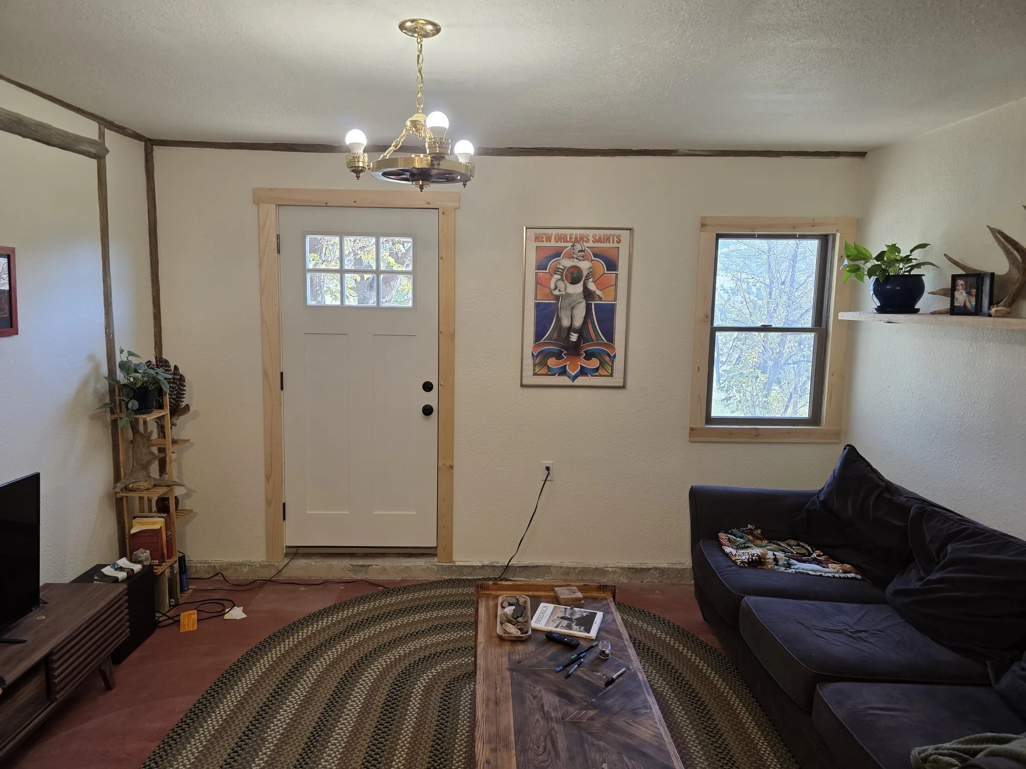 Finished entry wall with new drywall and trim, Cardwell, Montana bunkhouse remodel