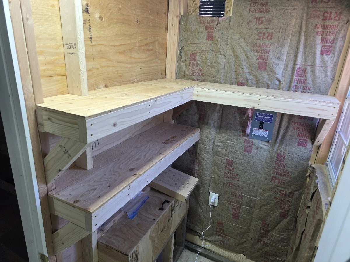 Roosts and shelving built inside the coop, Pipestone, Montana