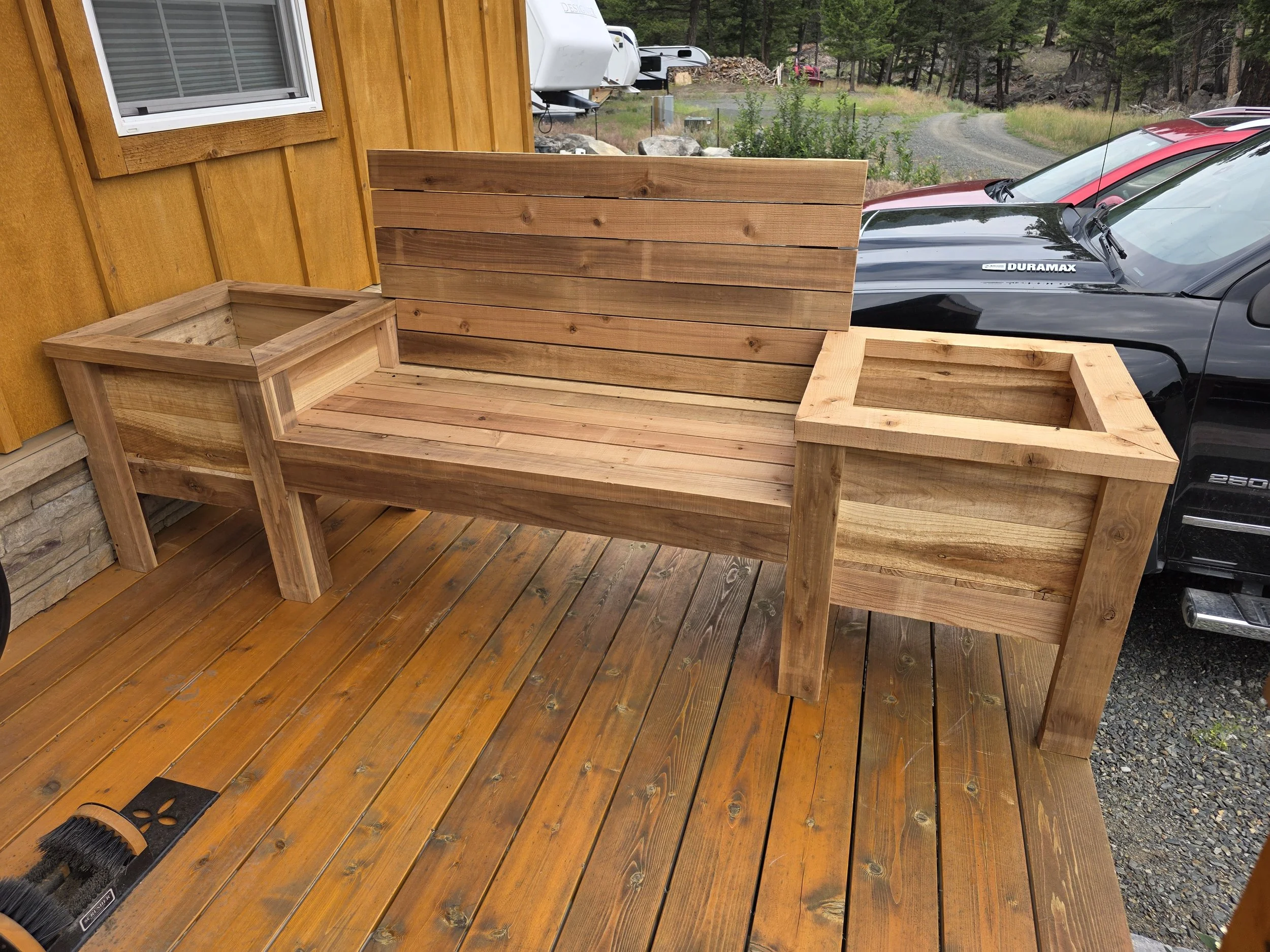 Cedar planter bench set on the customer's deck, Anaconda, Montana