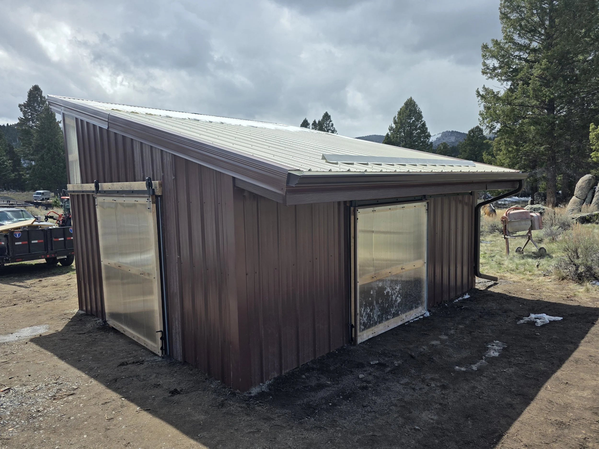 Closed-in bee shed with steel siding and roof, Whitehall, Montana