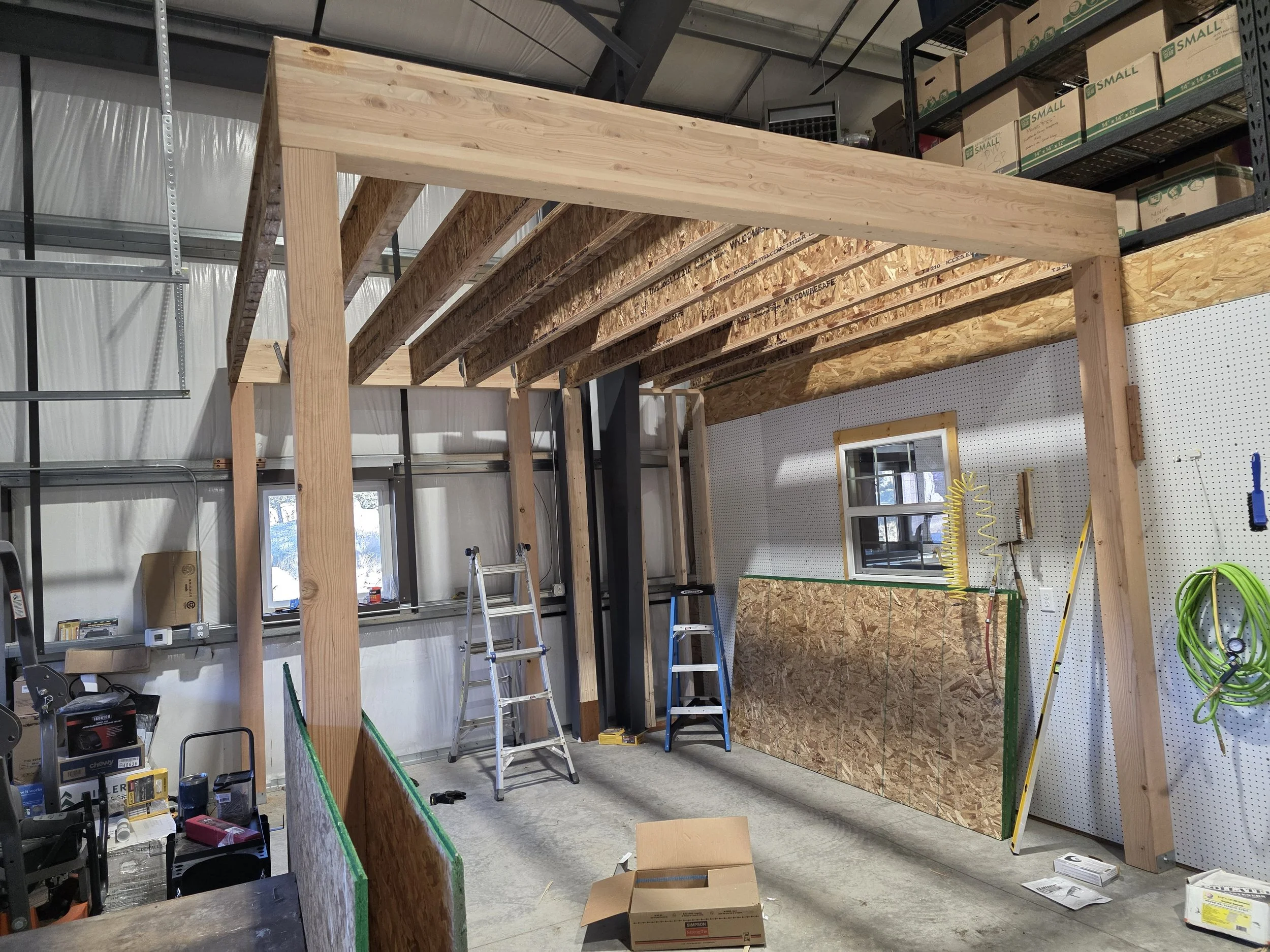 Posts and beams going up for a 12x24 shop mezzanine, Opportunity, Montana