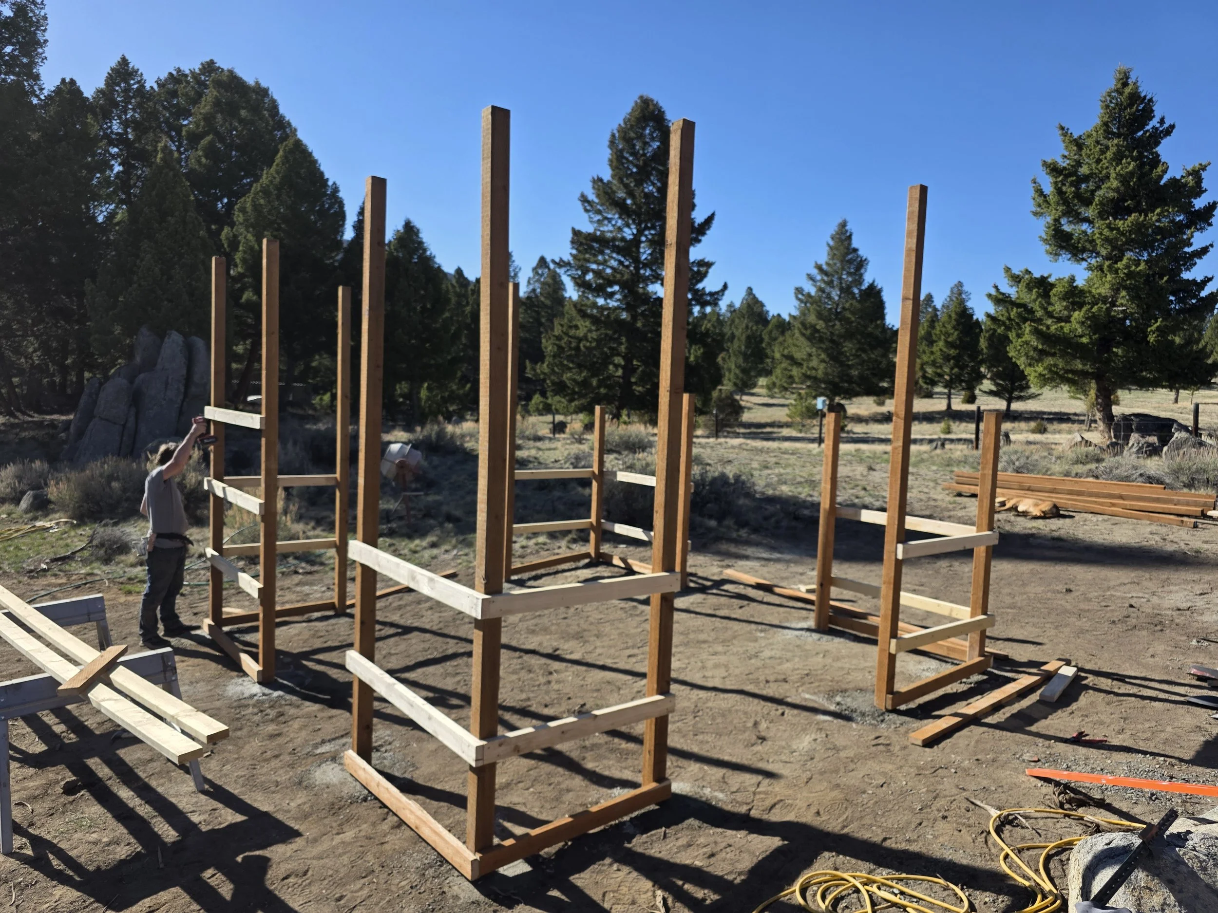 Girts going up on the bee shed posts, Whitehall, Montana
