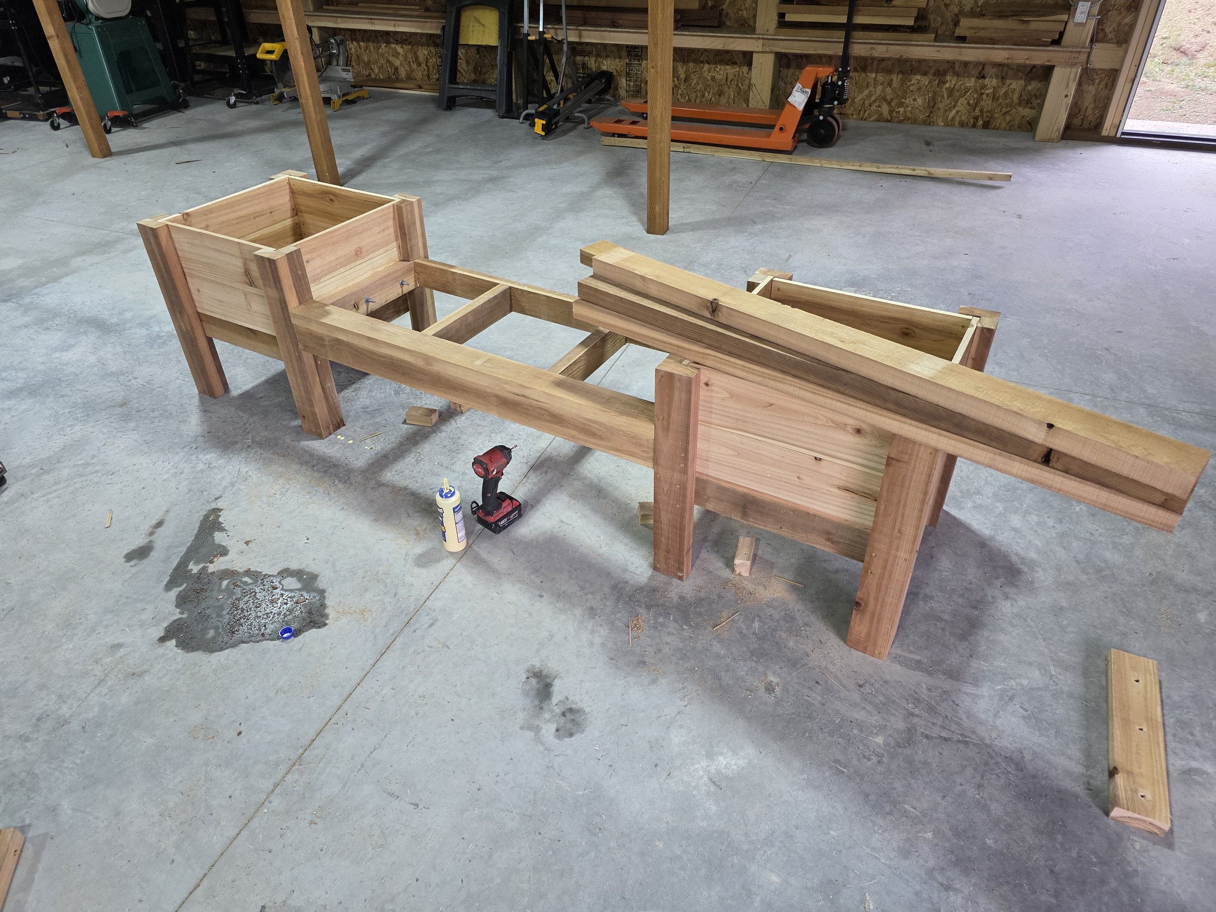 Cedar planter bench frame being assembled in the shop