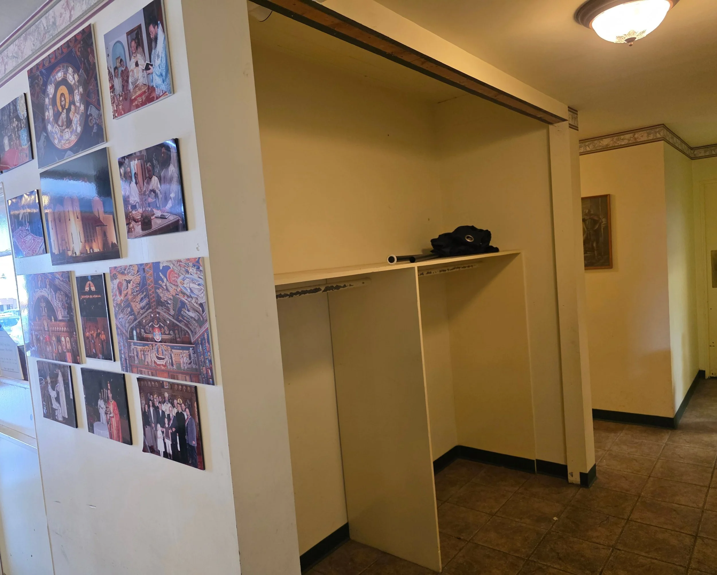 Old closet opening in the church hallway before the remodel, Butte, Montana