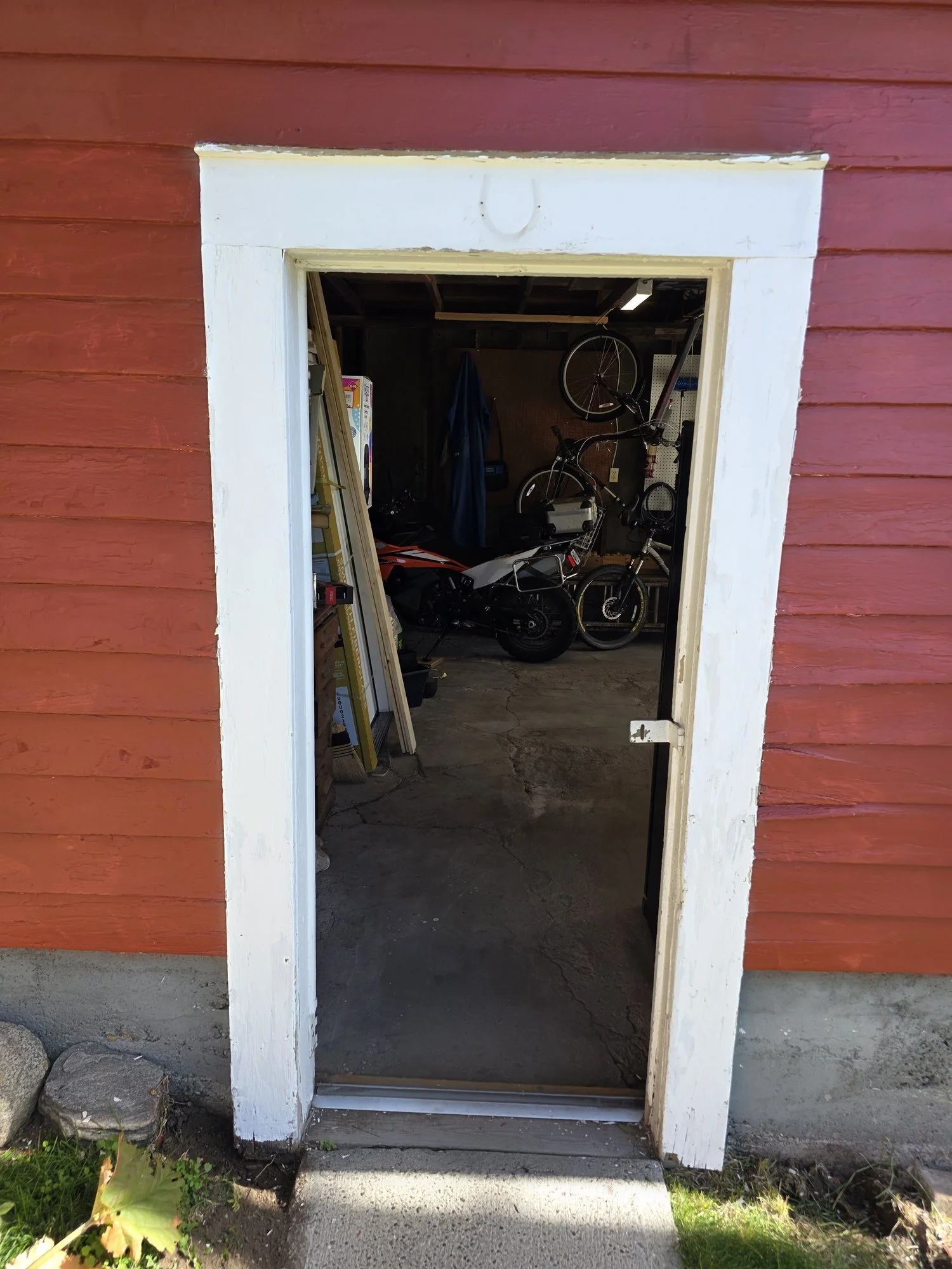 Old garage side door from outside before replacement, Butte, Montana