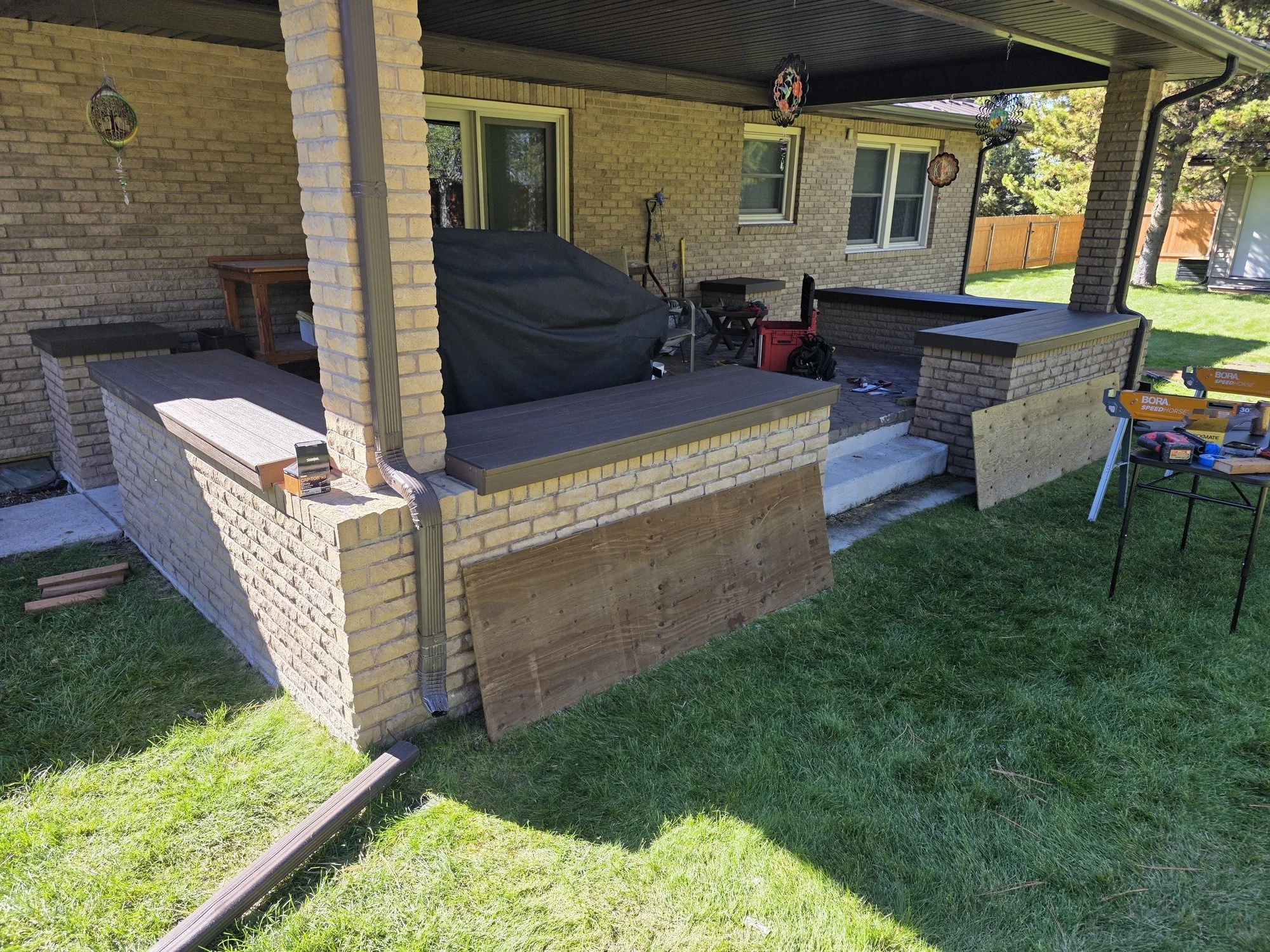 Planter bench covers in progress on the patio side of the house, Butte, MT