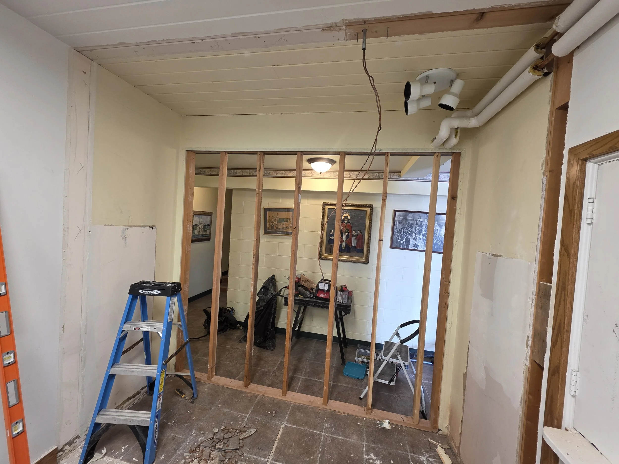 New stud wall framed to close off the church office, Butte, Montana
