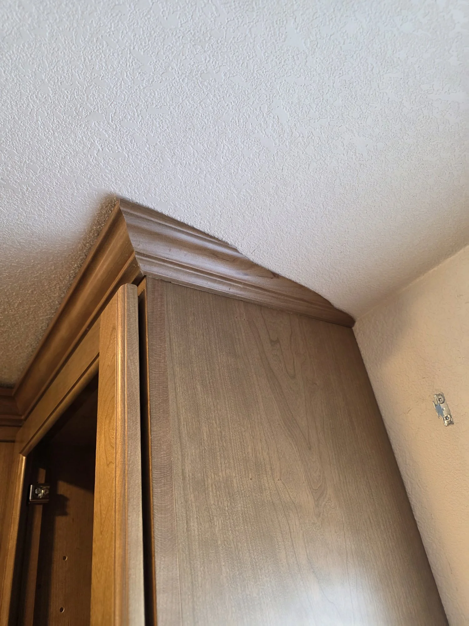Cabinet crown molding corner detail with tight miters, Anaconda, MT