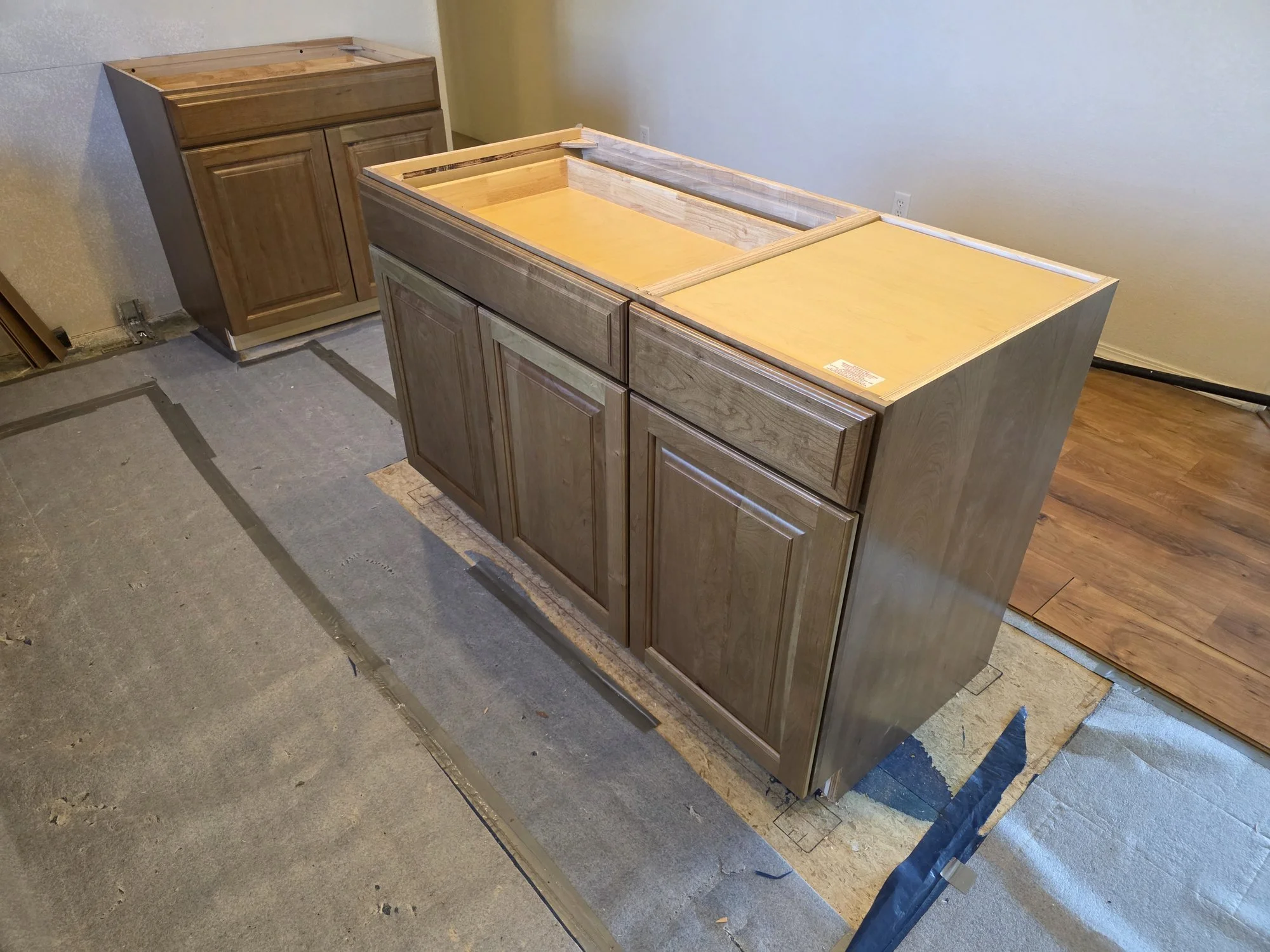 Island base cabinets set and squared in the Anaconda kitchen