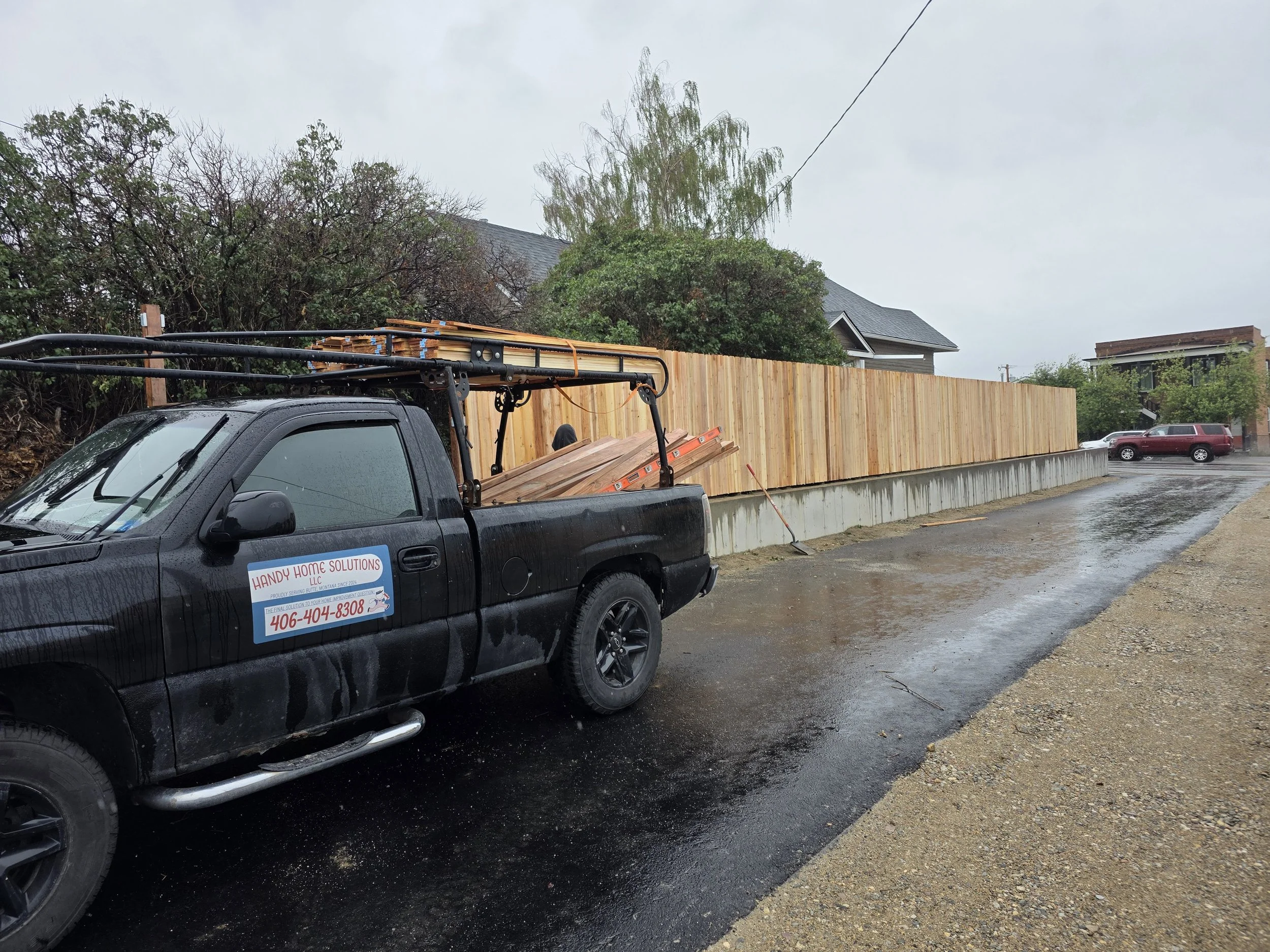 Handy Home Solutions truck at the cedar fence job, Uptown Butte, Montana