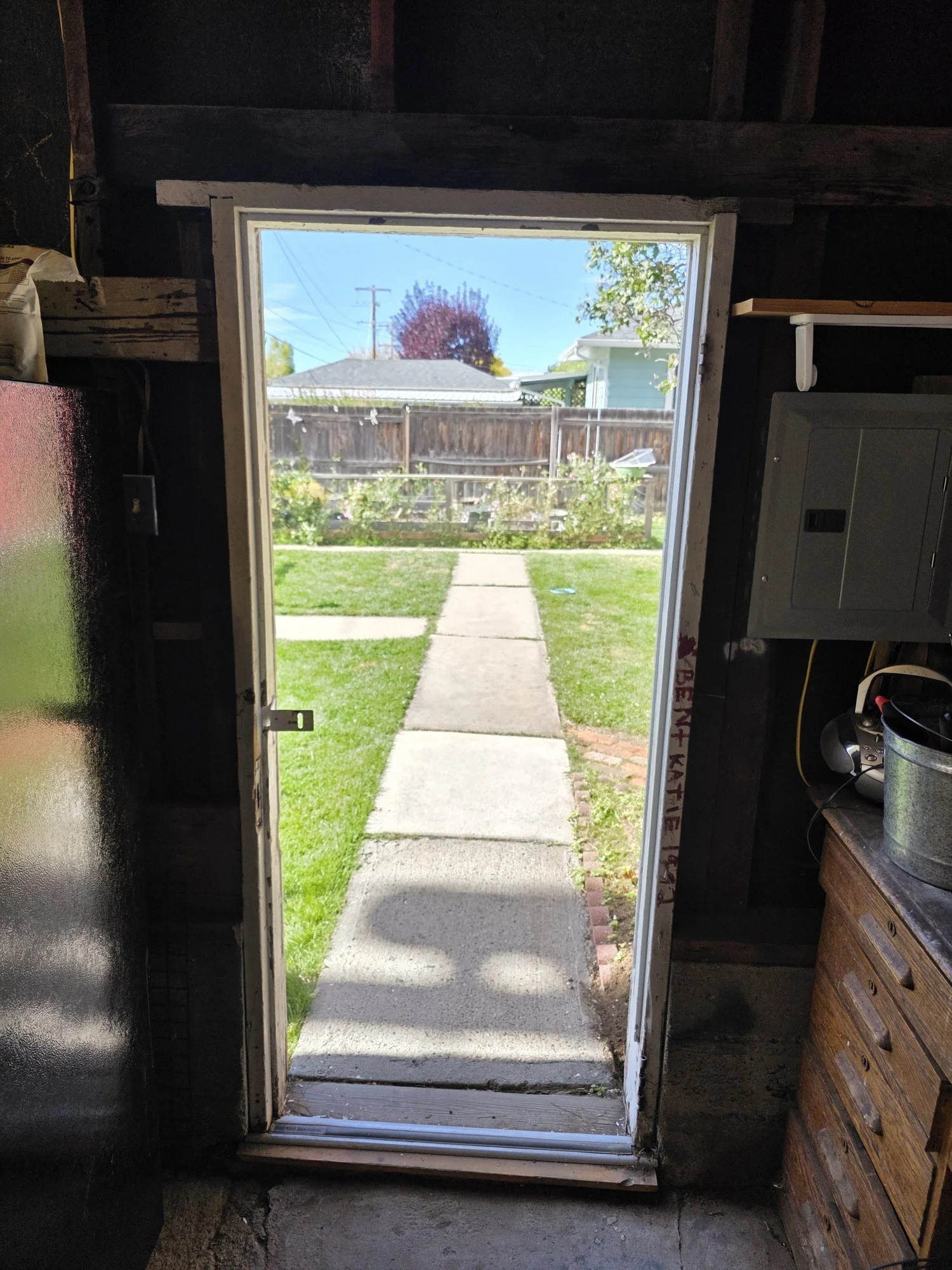 Old garage man door from inside before replacement, Butte, Montana