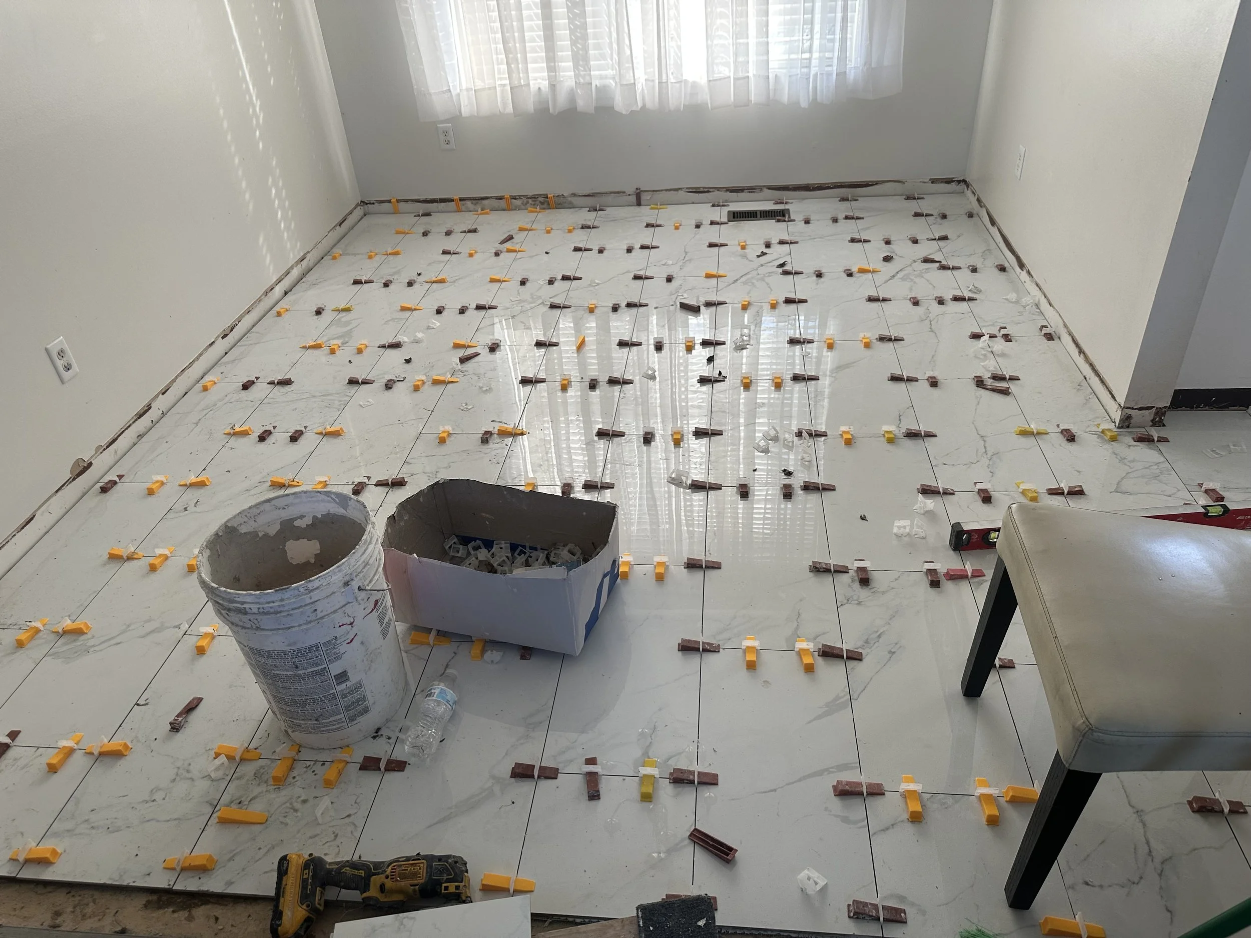 Tile flooring installation in progress